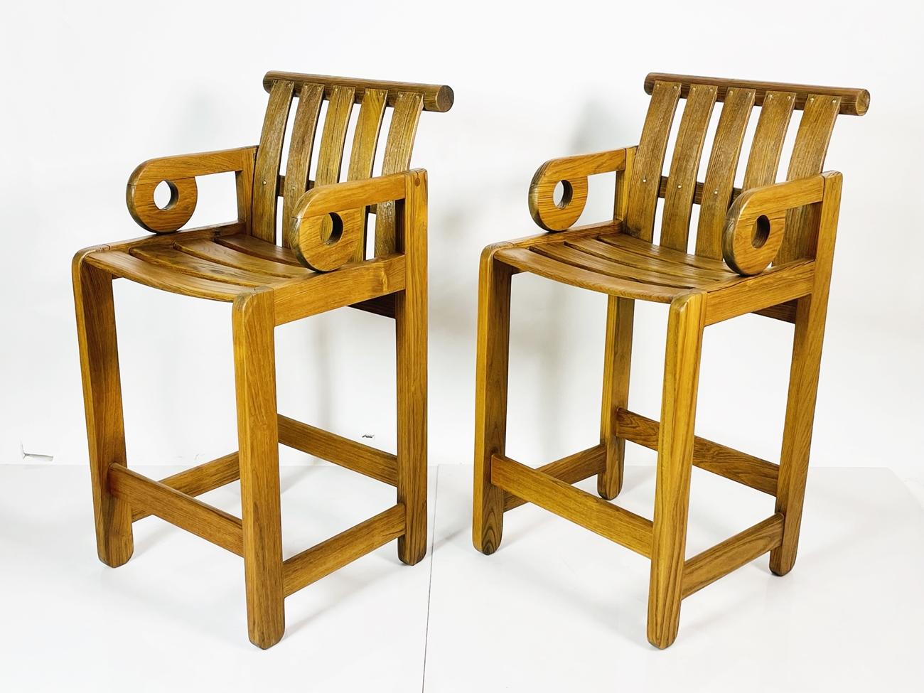An early and rare pair of Aperture barstools in teak by Monterey, California, designer, architect, and artist Kipp Stewart for Summit Furniture.

Impressively handcrafted of very substantial solid teak. Bold geometric lines and forms on display from
