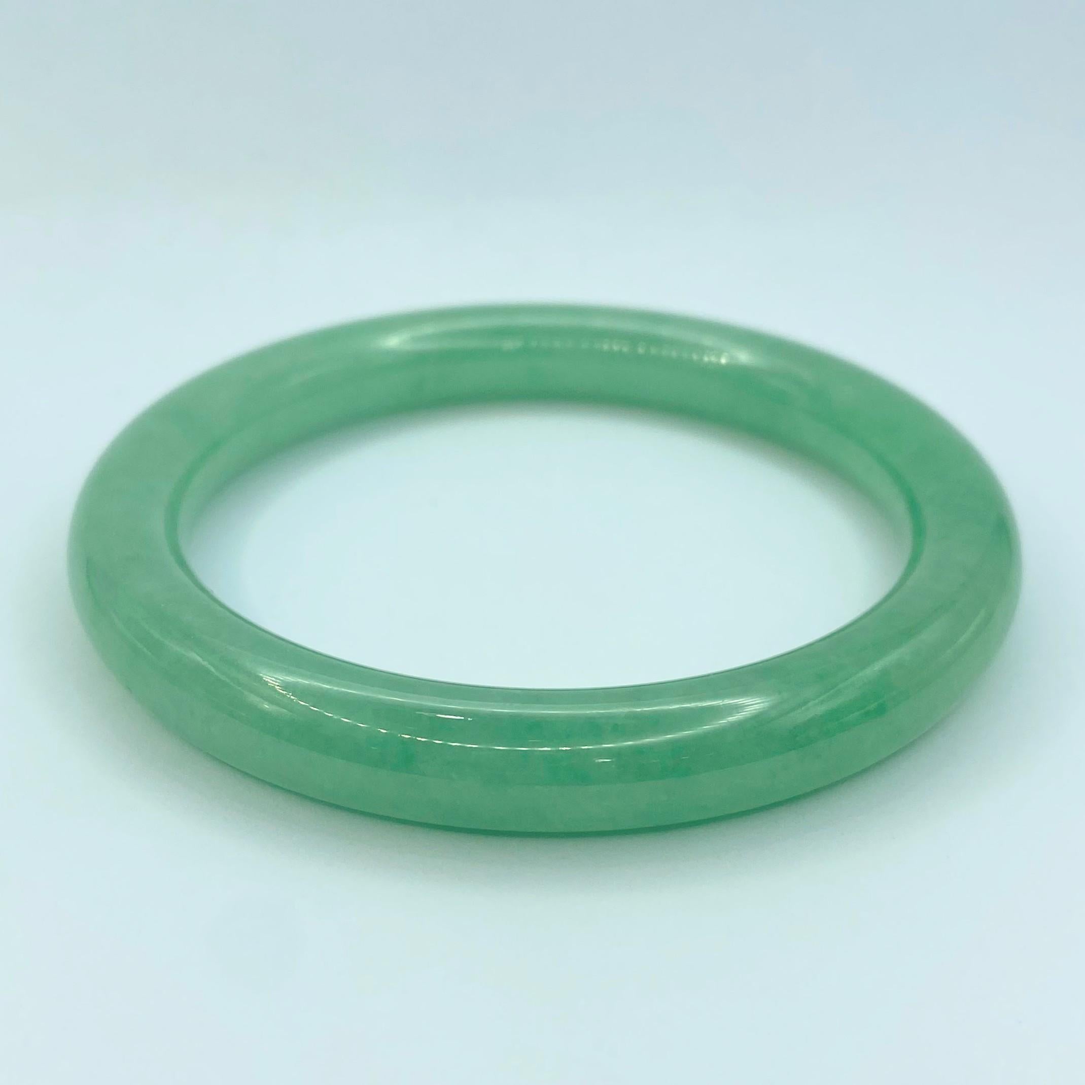 Contemporary Pair of Translucent Apple Green Jadeite Jade Bangles For Sale