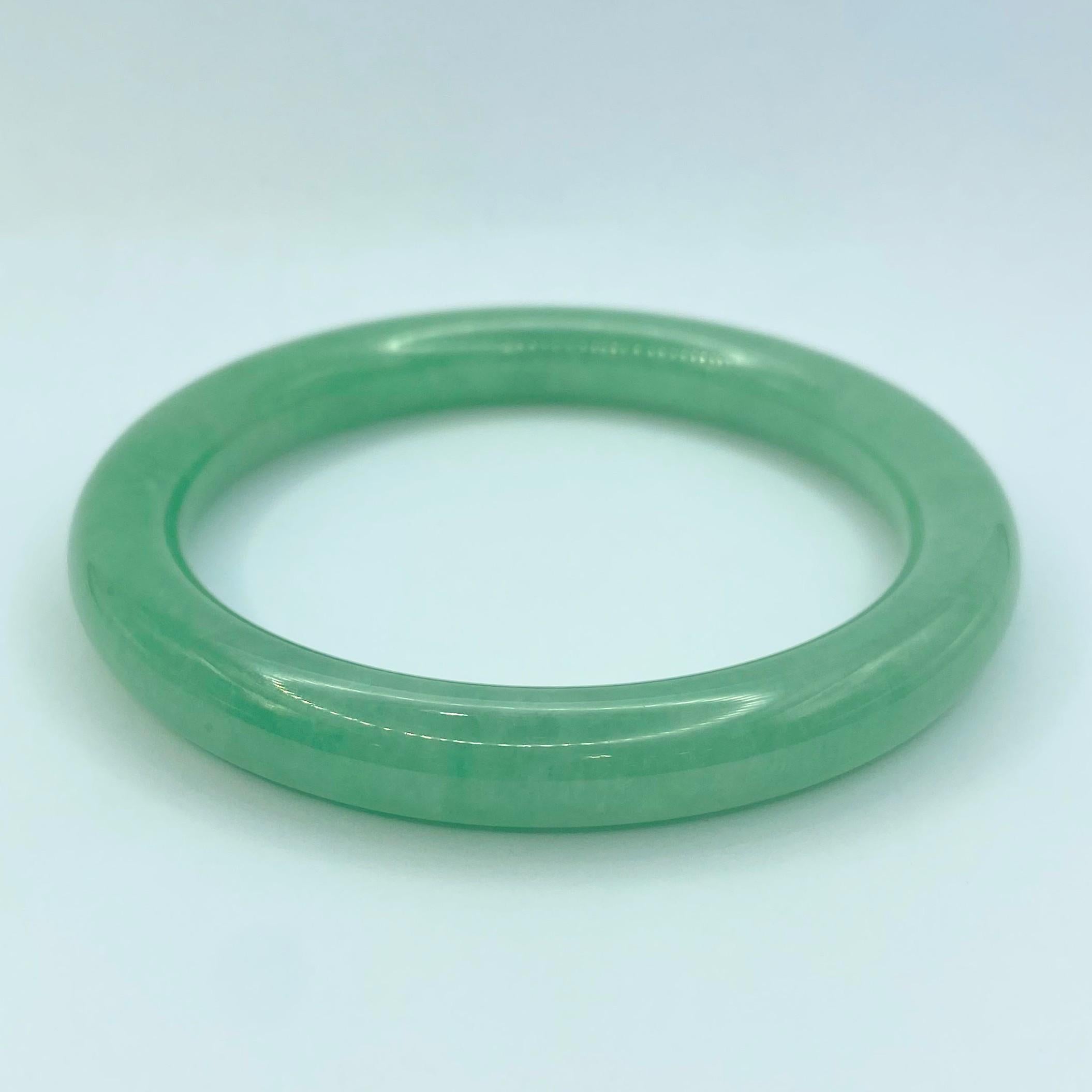 Round Cut Pair of Translucent Apple Green Jadeite Jade Bangles For Sale