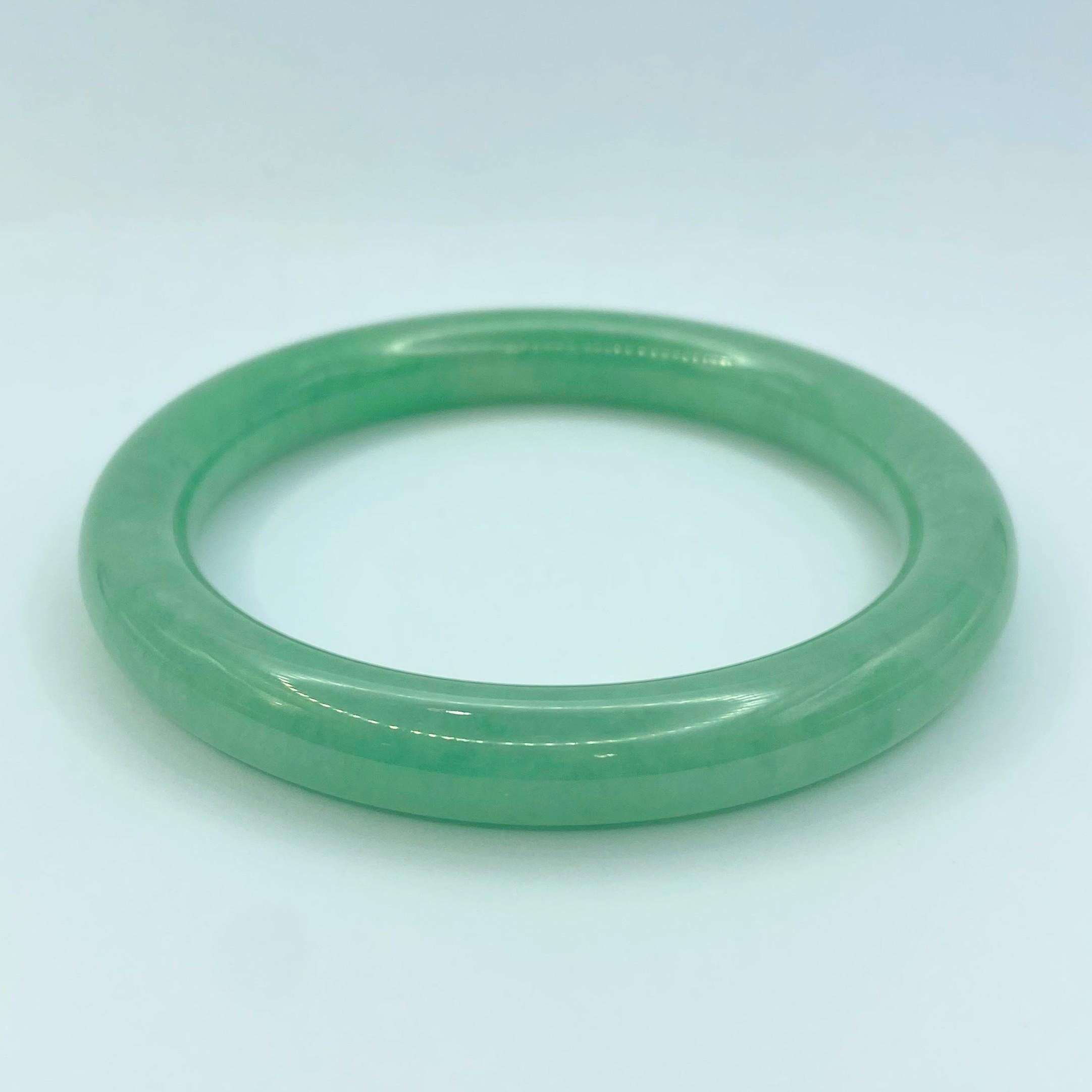 Women's Pair of Translucent Apple Green Jadeite Jade Bangles For Sale
