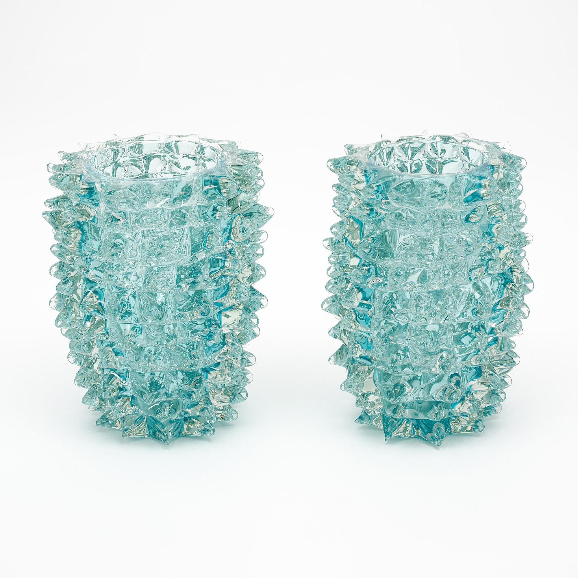 Pair of Italian Murano glass vases, in Aqua color, crafted in the “rostrate” technique, in the manner of iconic Murano glass powerhouse “Barovier