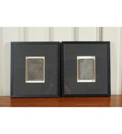 Coppia di scritte arabe incorniciate in una moderna cornice nera
