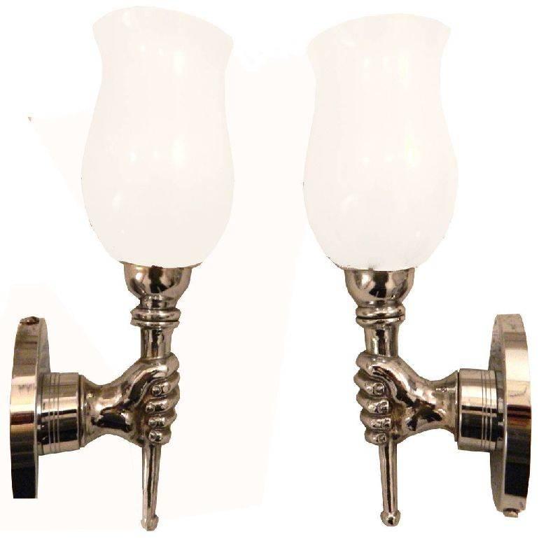 Very nice pair of circa 1950s of nickel-plated sconces by  Arbus. Original white Opaline shades. Two pair available, price for one pair. Measures: Back plates 3.5 inches. Silver Color Junction Box Covers available, please ask for a quote.
Wired for
