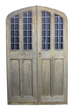 Pair of Arched Oak Double Doors with Leaded Glass Panel, circa 1900