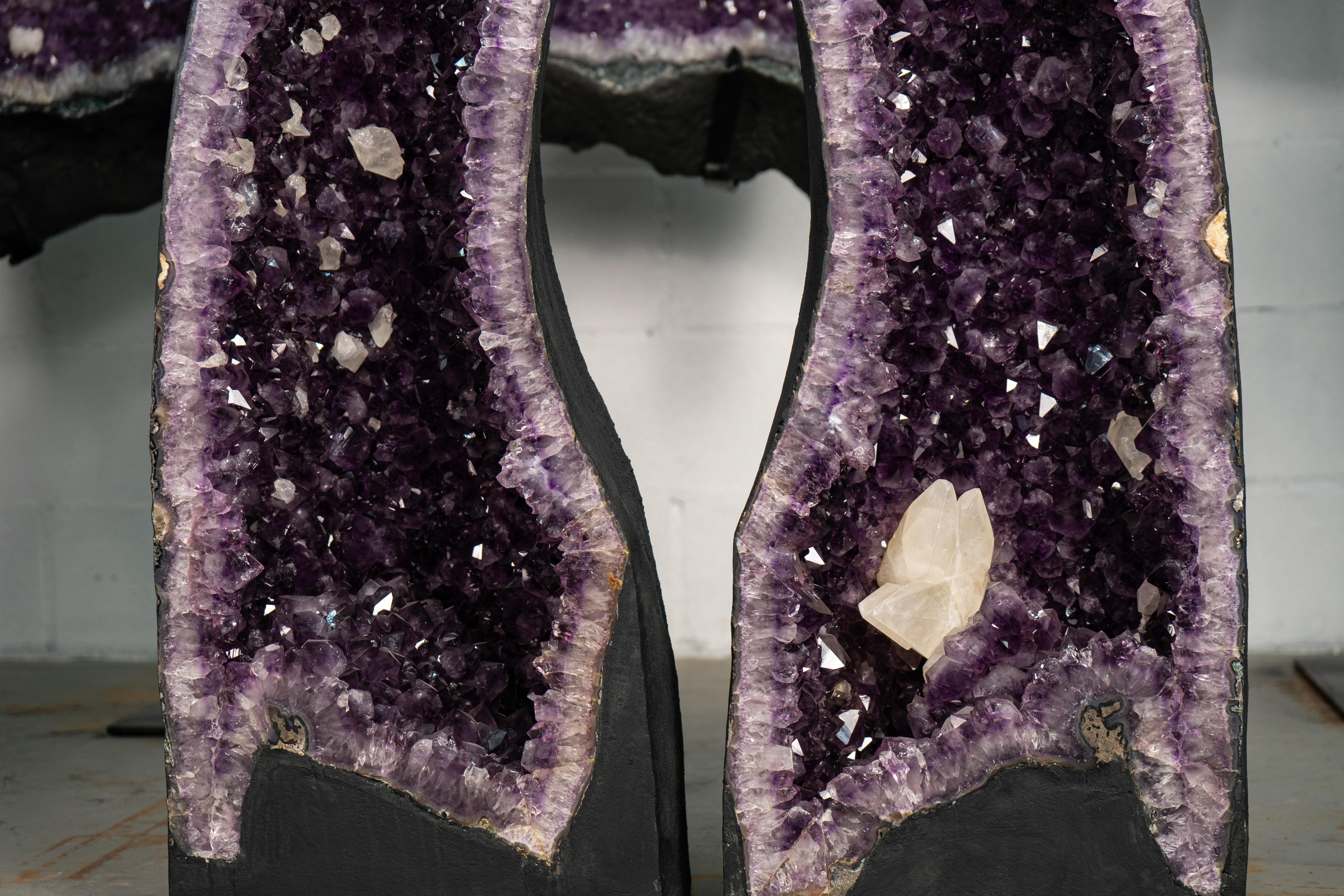 Brazilian Pair of Arched Purple Amethyst Cathedral Geodes with Large Calcite For Sale