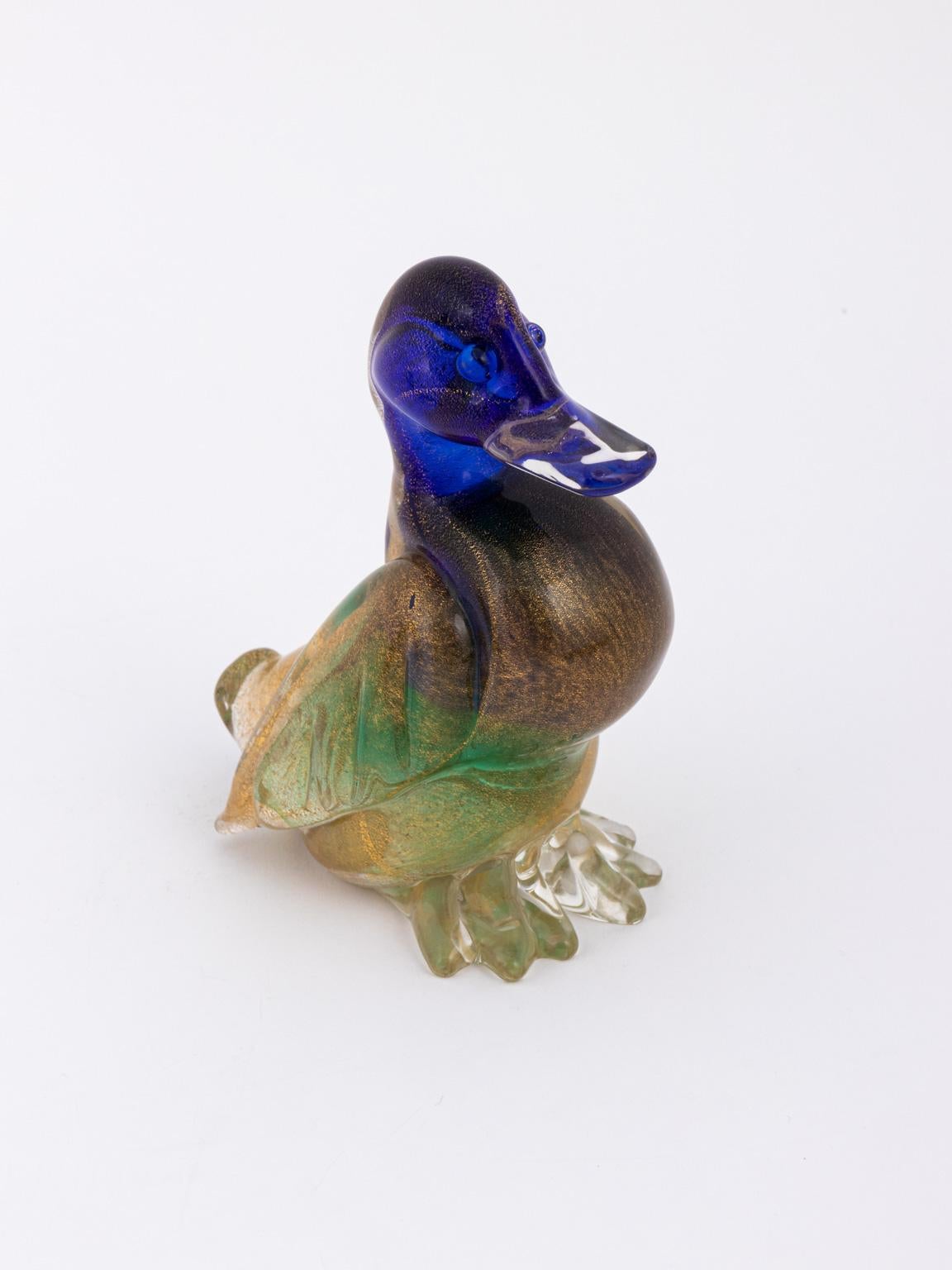 Set di anatre Bullicanti di Flavio Poli per la Vetreria Archimede Seguso, Murano, 1938 circa. Vetro incamiciato, trasparente e verde, strati multipli di lamina d'oro con blu e verde. Modello illuso. Umberto Franzoi, 