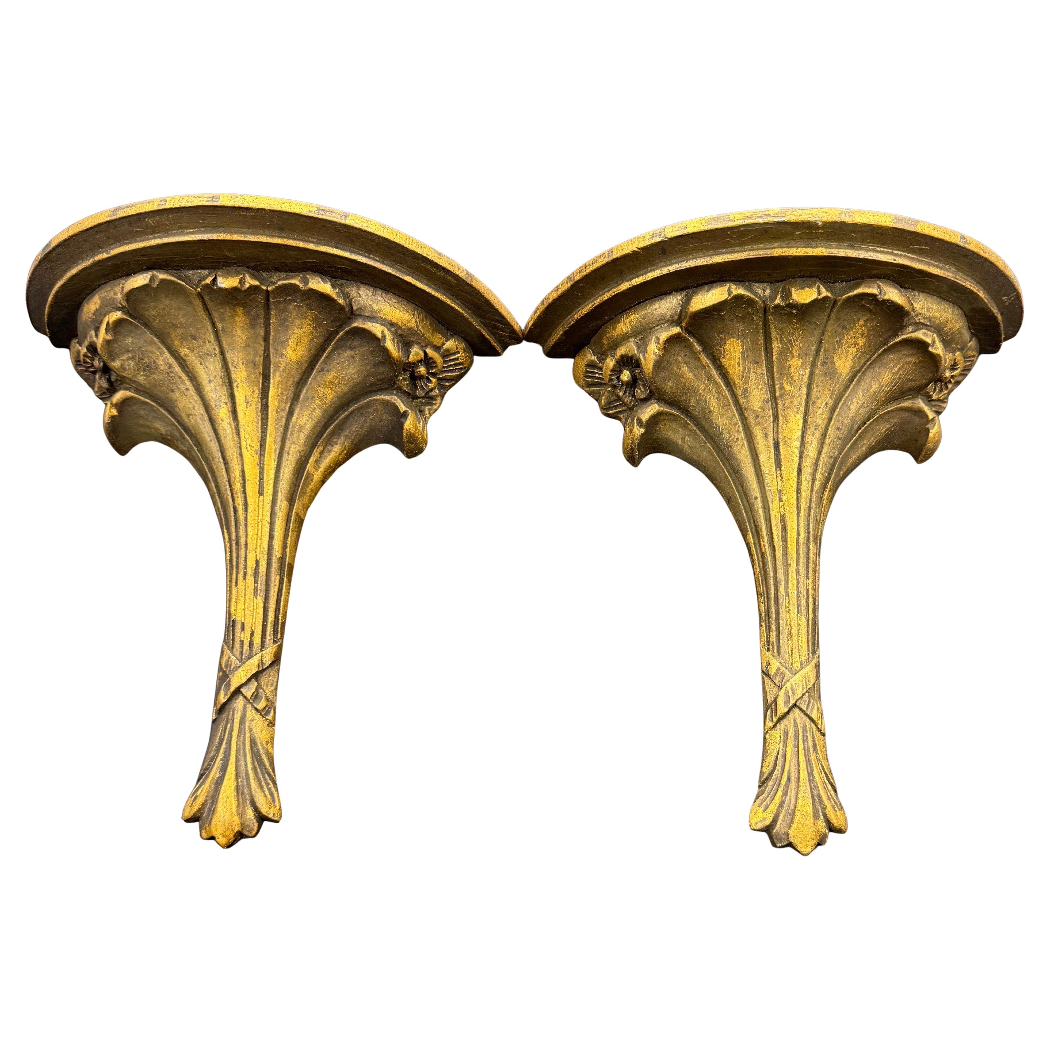 Gorgeous Pair of French Gold Gilt Wall Shelves. Could certainly stand alone as a pair on a wall or functional to hold treasures on top. Wonderful classic addition to any living room, dining room or bedroom setting.
