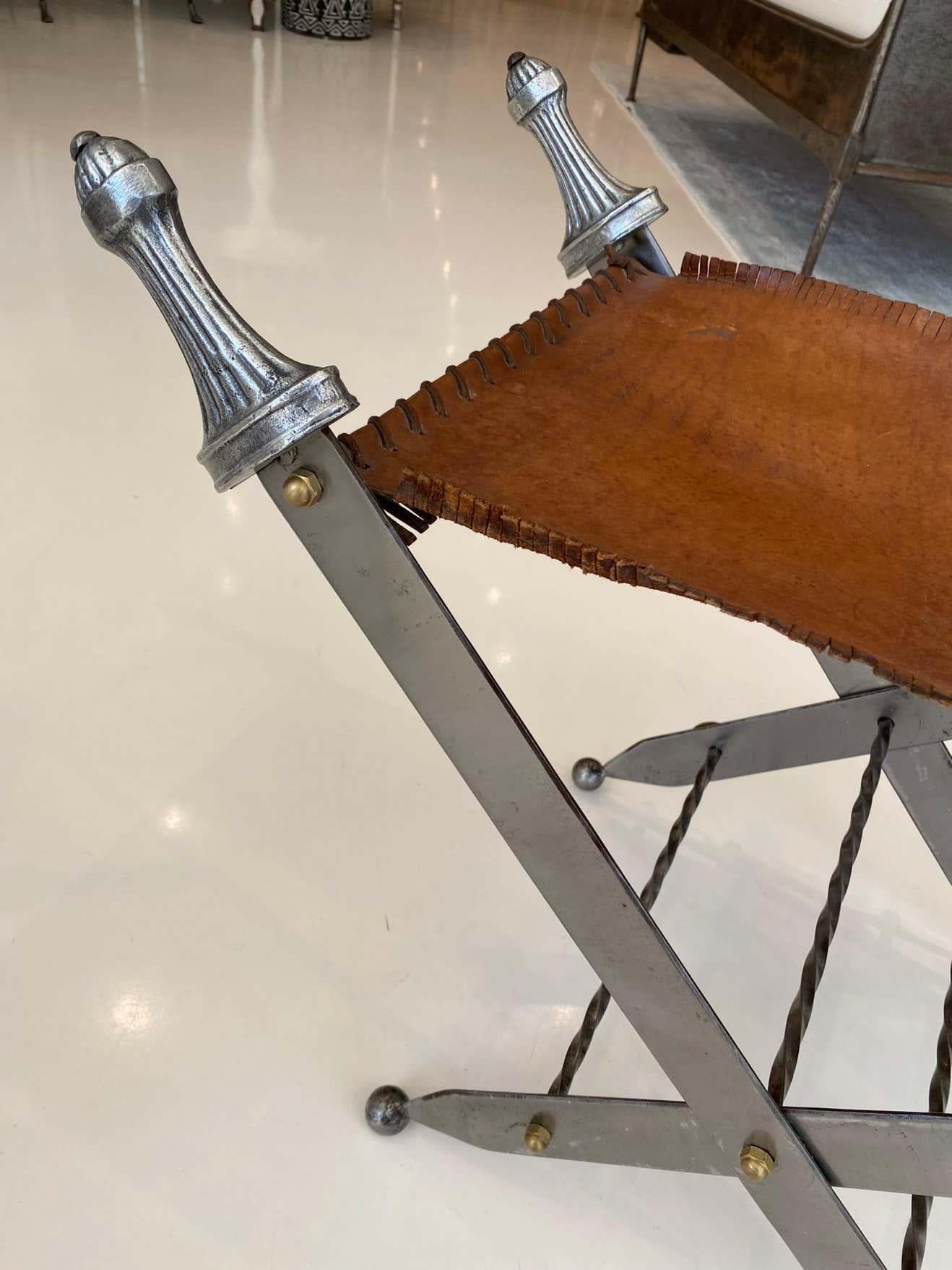 Pair of Argente Metal Sword and Leather Stools In Fair Condition For Sale In New Orleans, LA