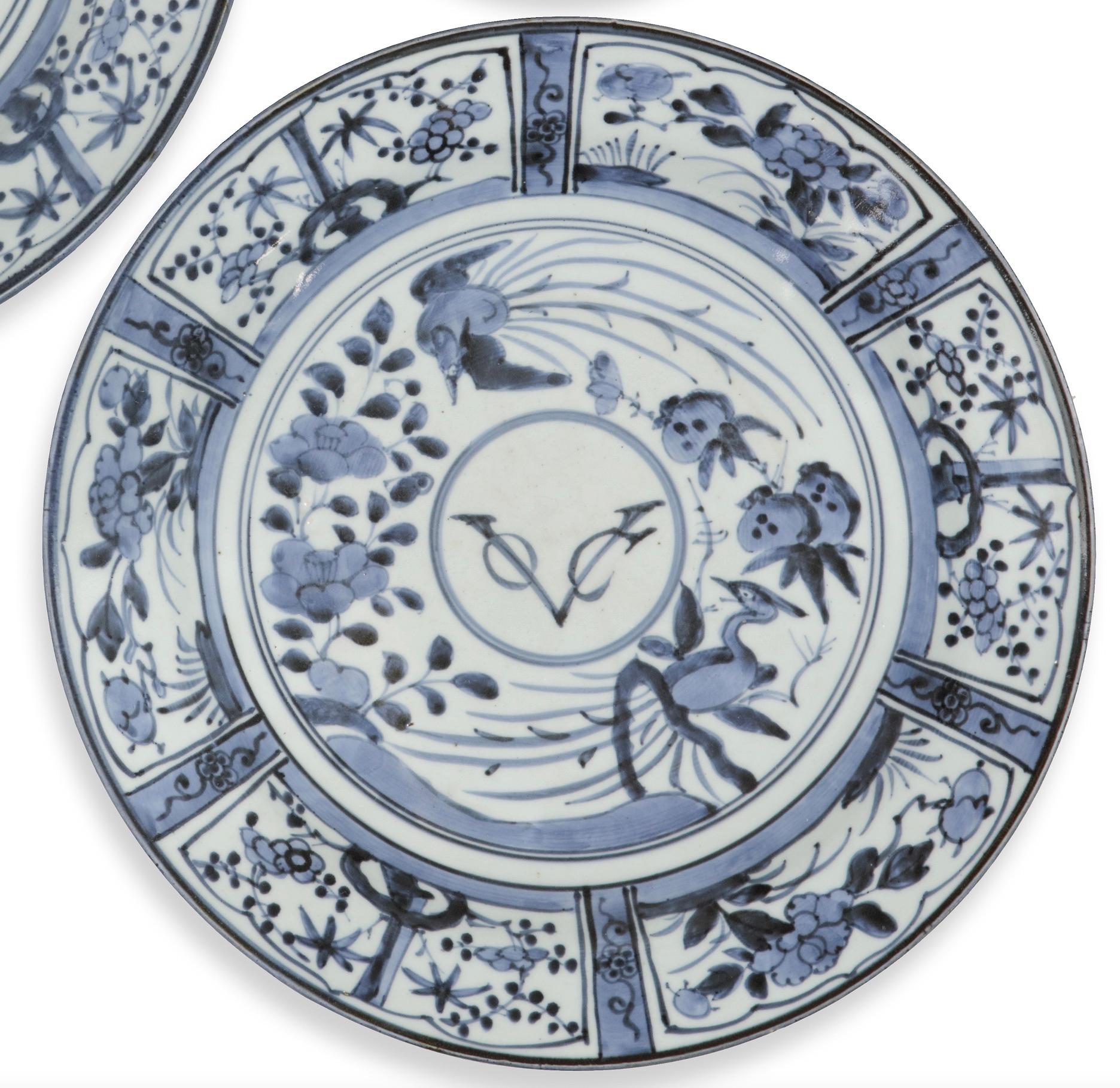 A splendid pair of large Japanese Arita blue and white porcelain VOC chargers and a rare small VOC dish
Arita, late 17th century

Diam. 36,5 cm (chargers)
Diam. 22 cm (small dish)
Come with mounts for wall-hanging

Provenance:
Noble collection, the