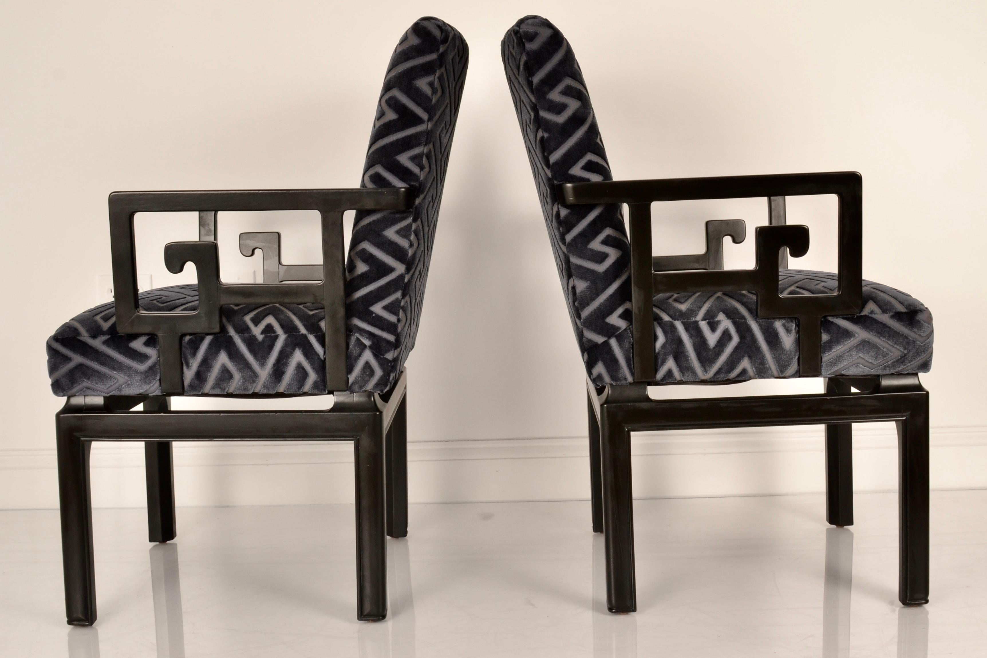 A modern Classic from the Far East collection designed by Michael Taylor for Baker Furniture, launched in 1949. These chairs have been fully restored in black satin lacquer and all new upholstery featuring a Greek key patterned cut velvet in a dark