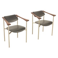 Paire de fauteuils à dossier pivotant des années 1960
