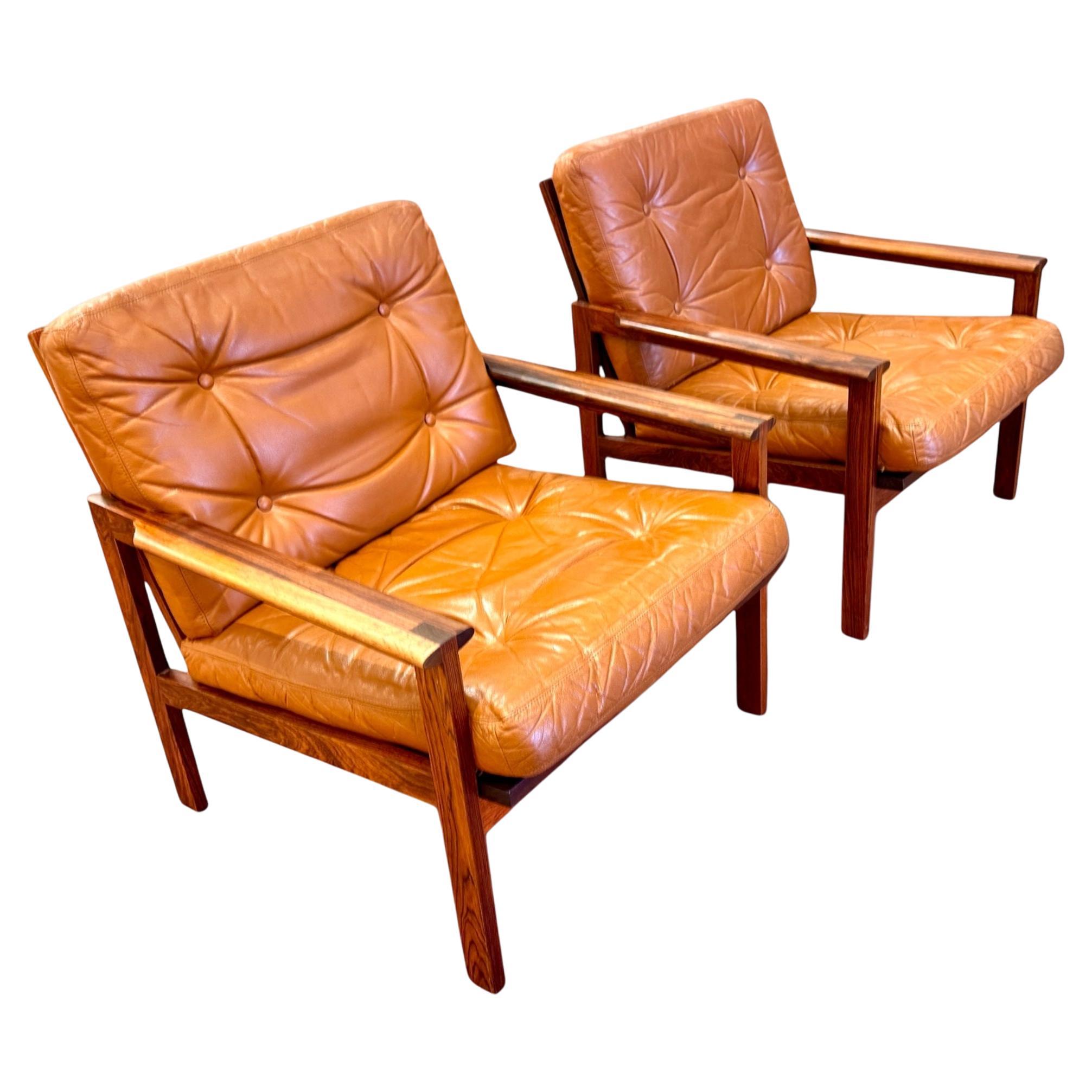 Pair of armachairs  by Illum Wikkelso leather and rosewood