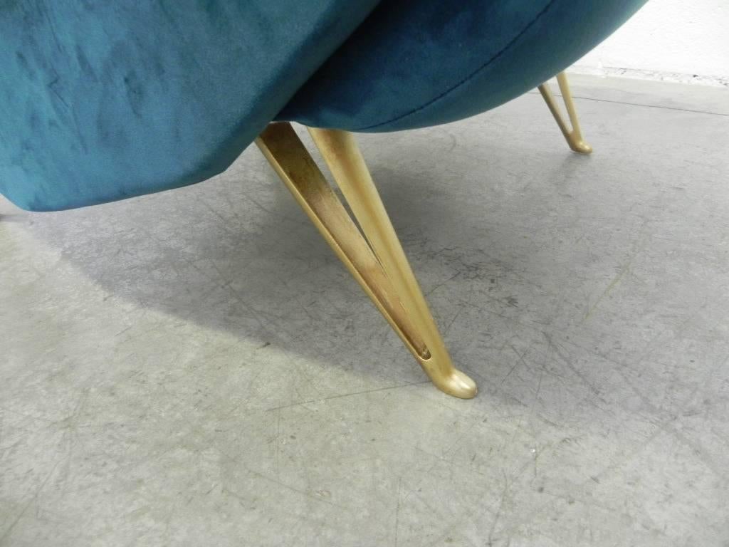 Elegant high armchair velvet upholstery, gilt metal curved feet. I.S.A. Bergamo manufacturer, Italy, 1950s.
