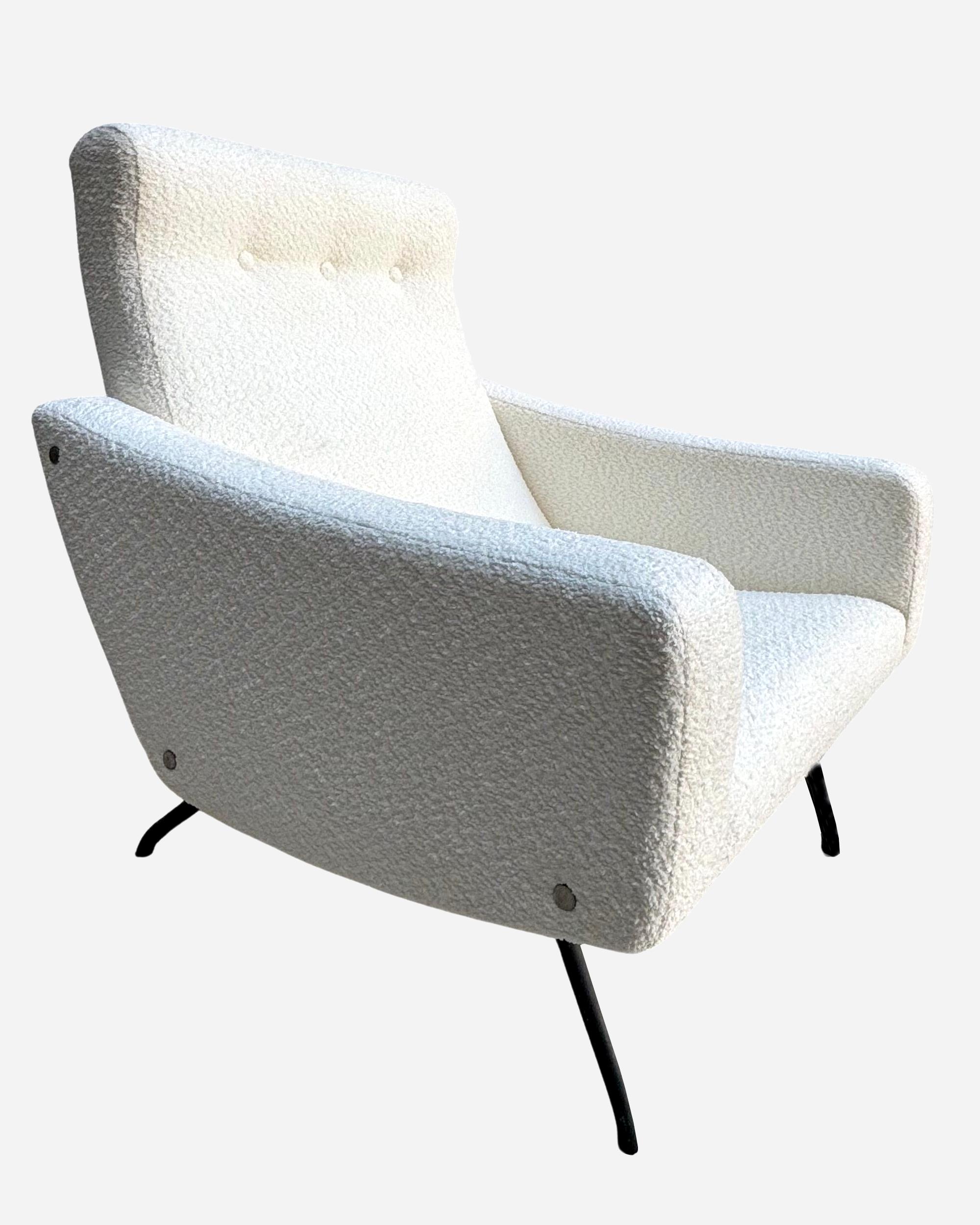 Joseph-André Motte (1925-2013), designer & Steiner, editor.

Pair of comfortable lounge chairs.
Black lacquered tubular metal frame. New upholstery and recent cover in ‘bouclette’ fabric.

Bibliography: ‘La Maison Française’ 1957. Identical model