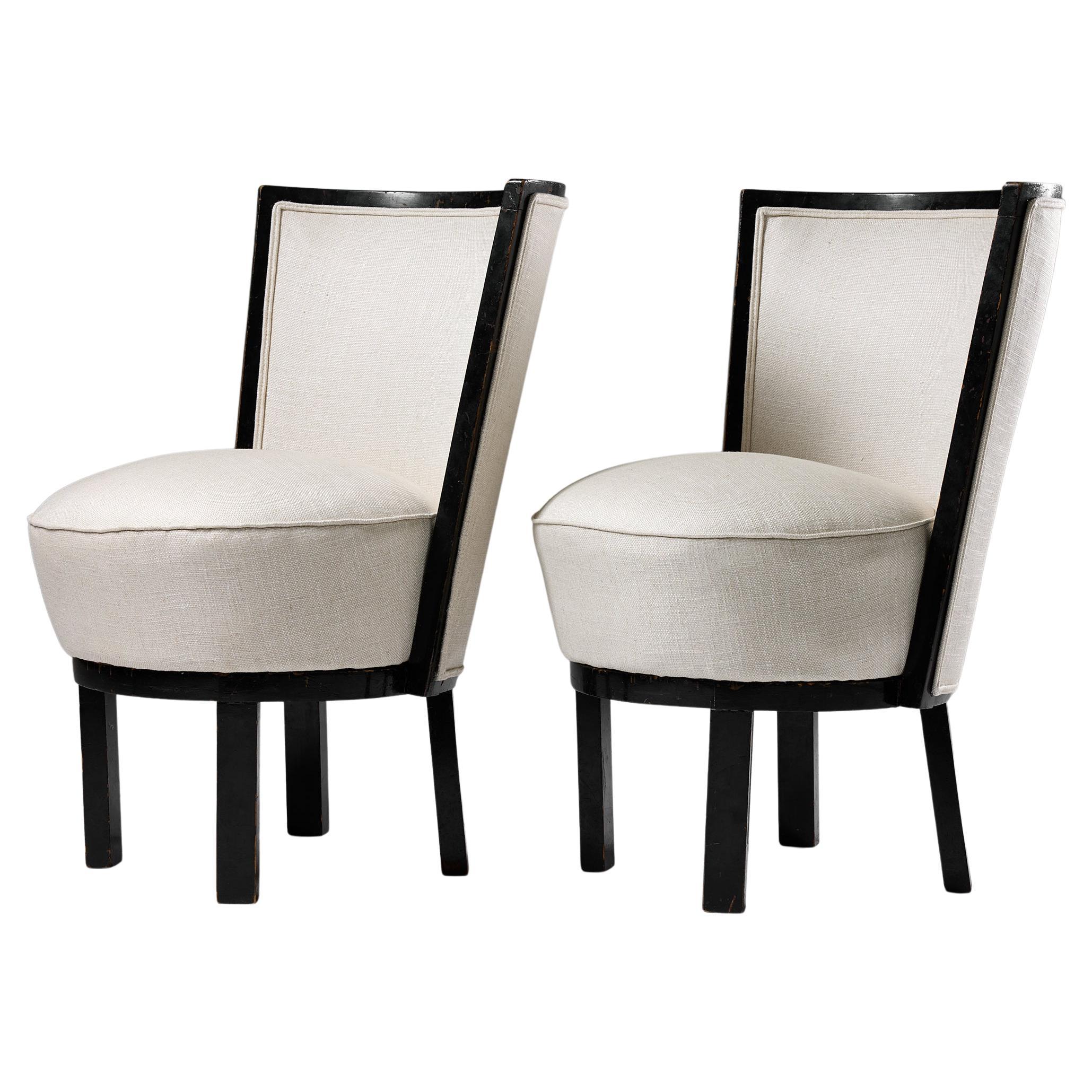Pair of black lacquered wood Swedish Art Deco armchairs