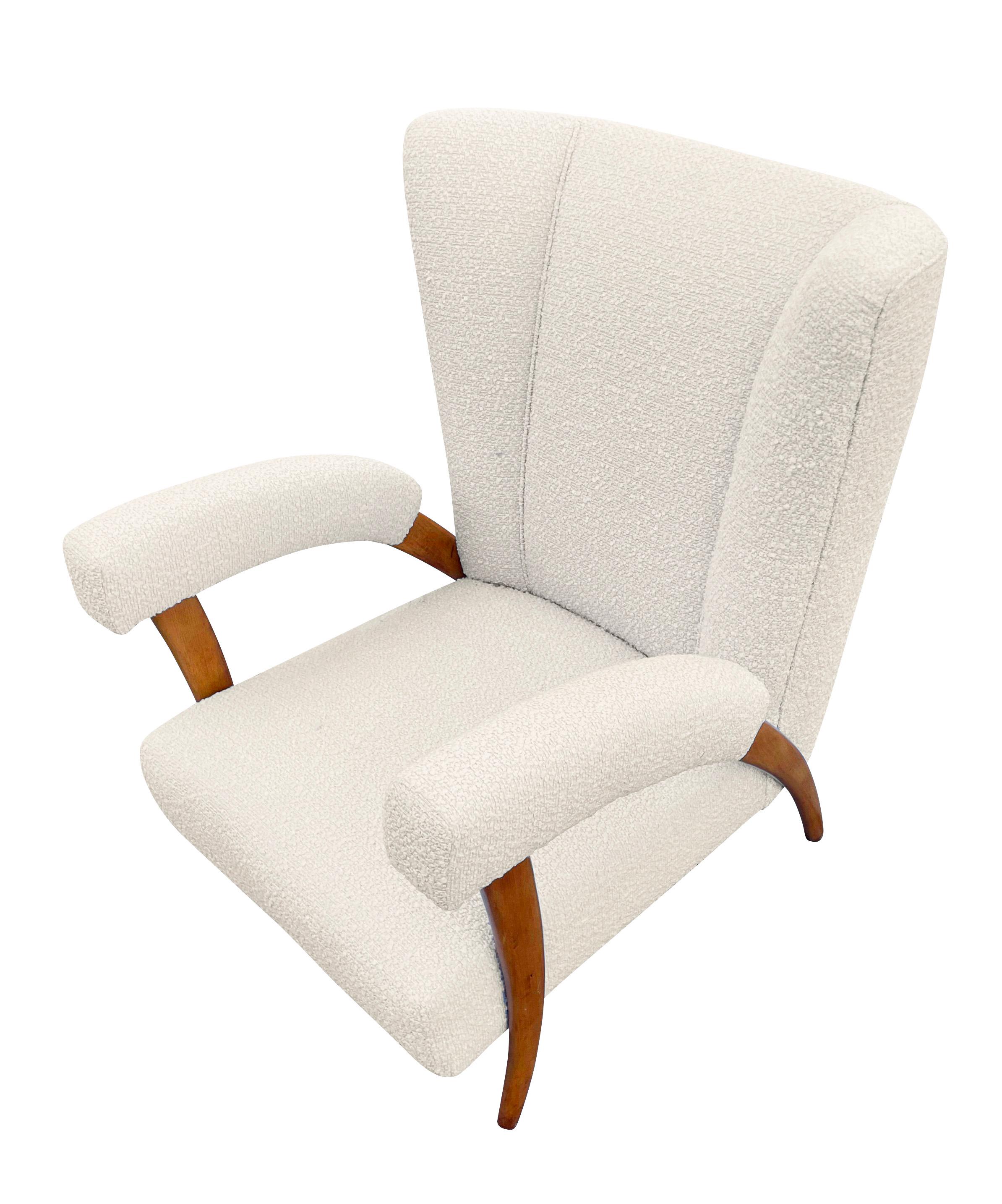 Pair of armchairs attributed to Paolo Buffa, Italy, 1950s.
$9,900.00.
Pair of beautiful 1950s Paolo Buffa lounge chairs with “tusk” shaped legs. Upholstered in an off-white boucle fabric.

Condition: Minor wear consistent with age and use.