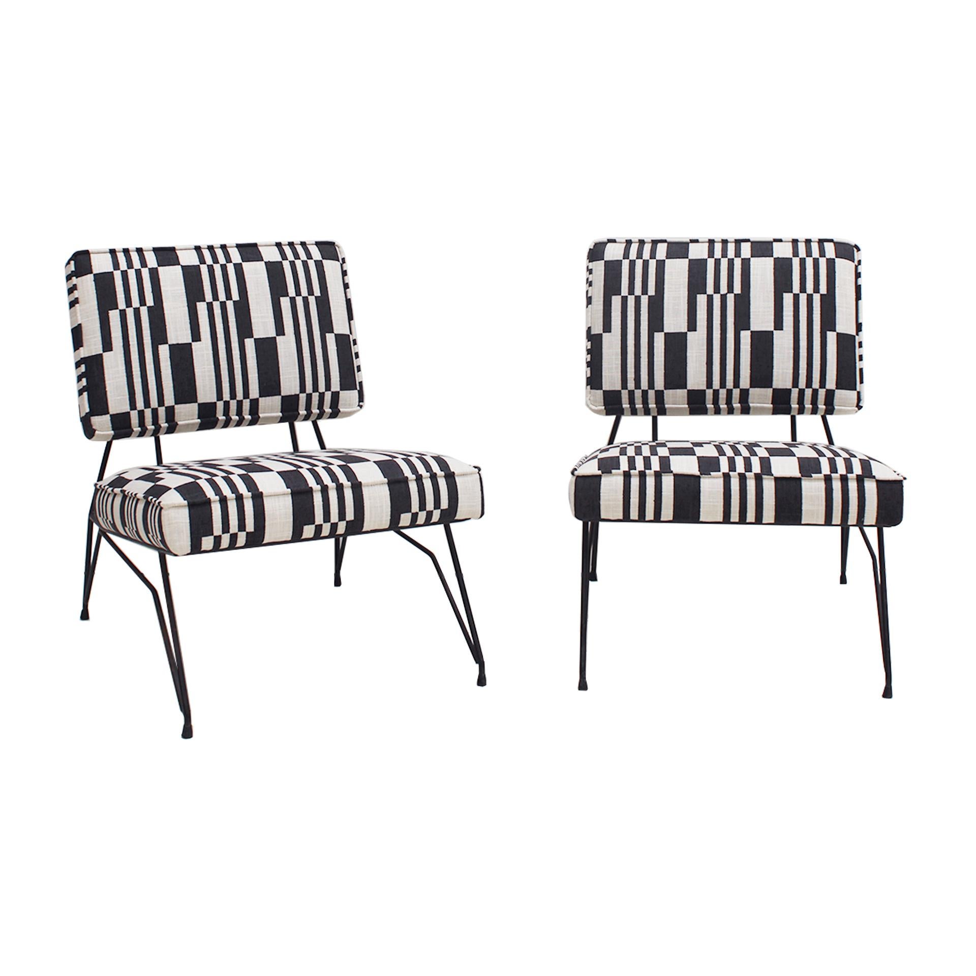 Pair of armchairs designed by Cerruti Di Lissone made with a tubular structure in black lacquered steel. Linen upholstered with a black and white rectangular design print. Italy 50s.