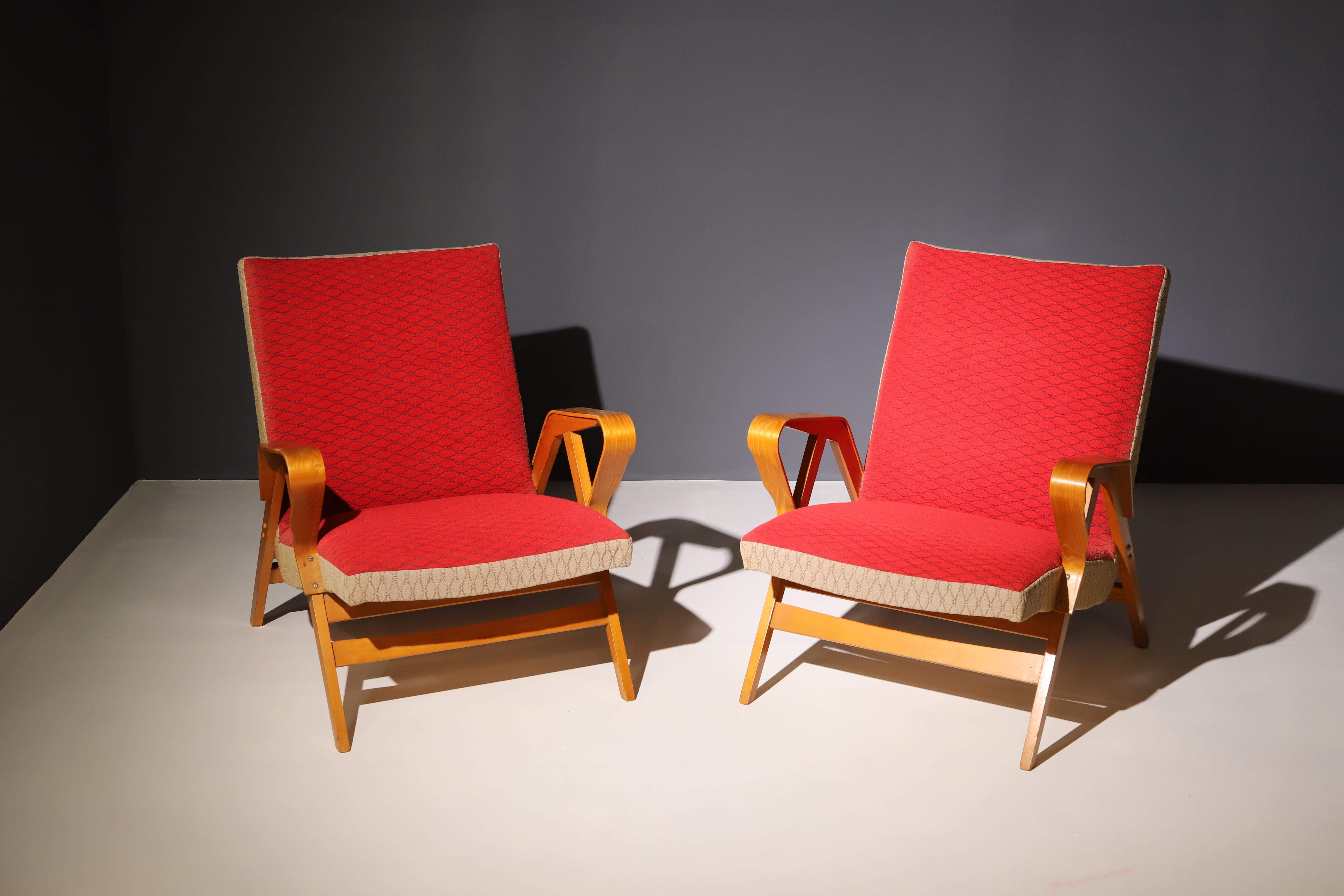 Pair of a popular occasional bentwood armchairs designed by František Jirák for Tatra nábytok, made in the former Czechoslovakia in the 1970´s. It´s made of beechwood and plywood, upholstery. In good Vintage condition, shows signs of age and