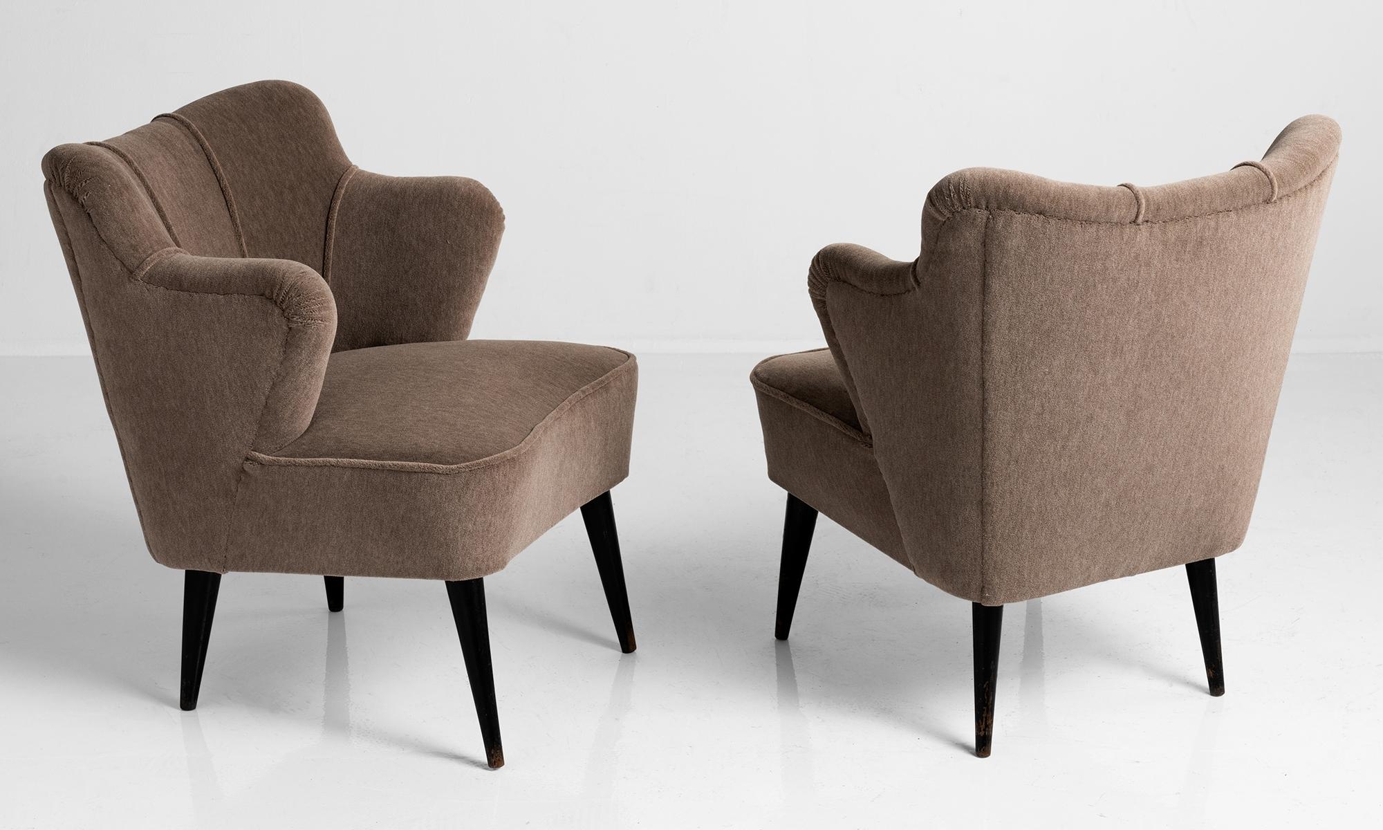 Unique modern forms with shortened armrests, newly upholstered in Maharam Mohair Supreme.
