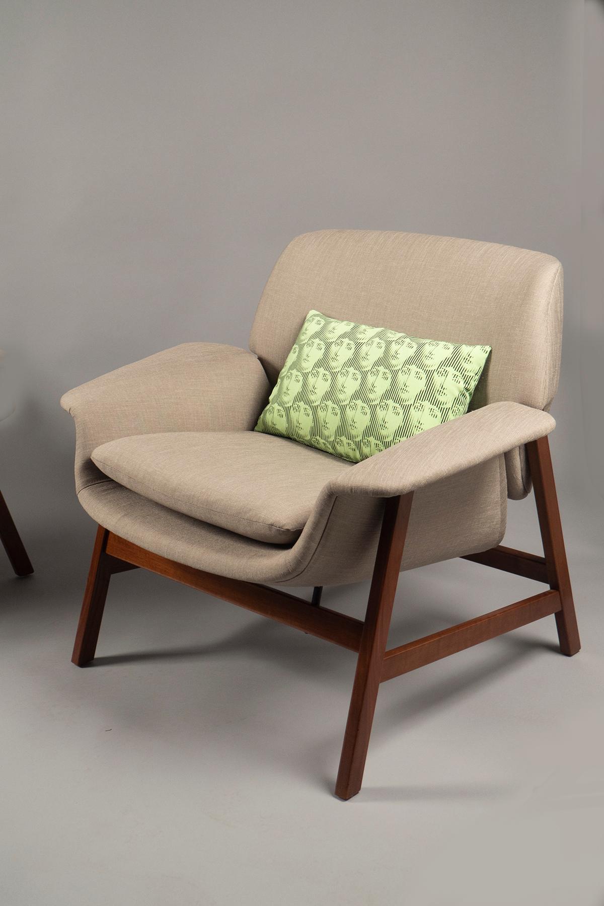 Upholstered back, armrests and seat with a loose cushion, raised on a walnut structure. Two pillows featuring vintage Fornasetti silk are included.
    