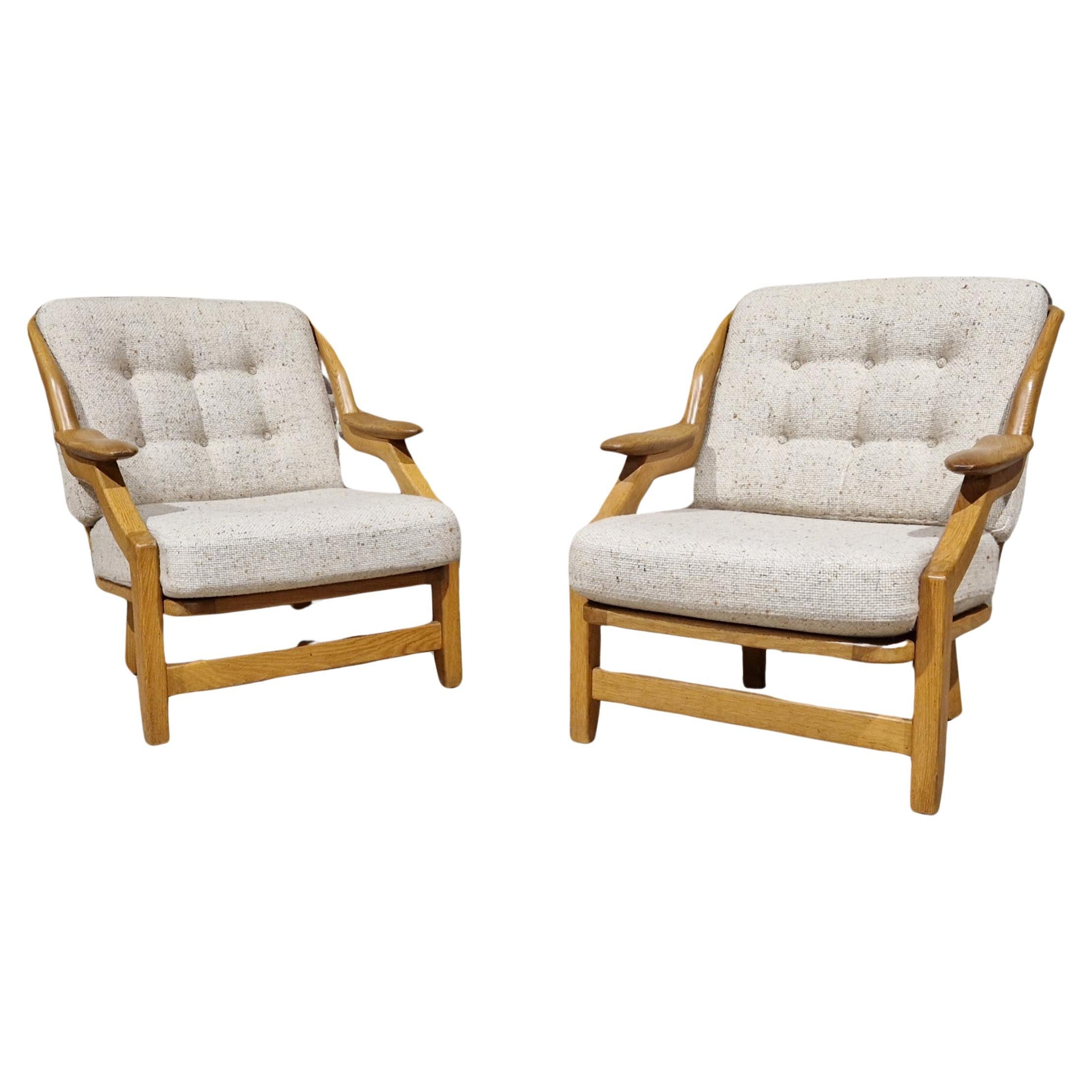 Pair of armchairs by Guillerme et Chambron