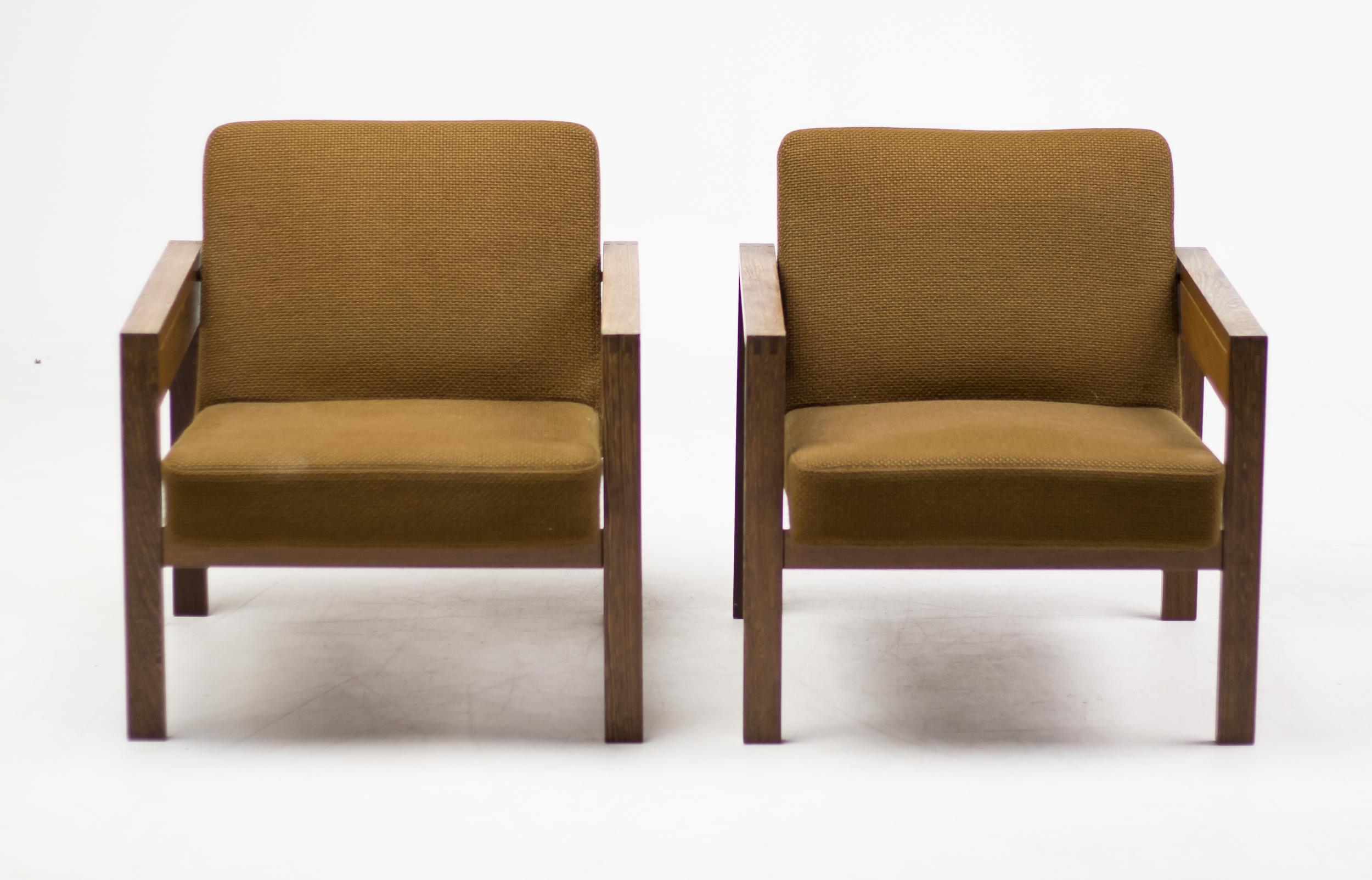 Set of armchairs designed by the Dutch architect Hein Stolle for Spectrum, the Netherlands, in unrestored original condition. Wengé frame and original De Ploeg wool fabric. The foam is still resilient and the fabric doesn't have any stains or