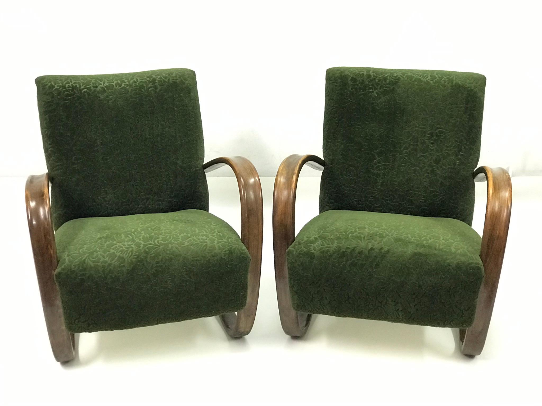 The armchairs are very nice condition, construction is original wood color, stable. The armchairs were upholster in 90 ages but not professional (viz foto). The textile is not demage therefore they are immediately usable.