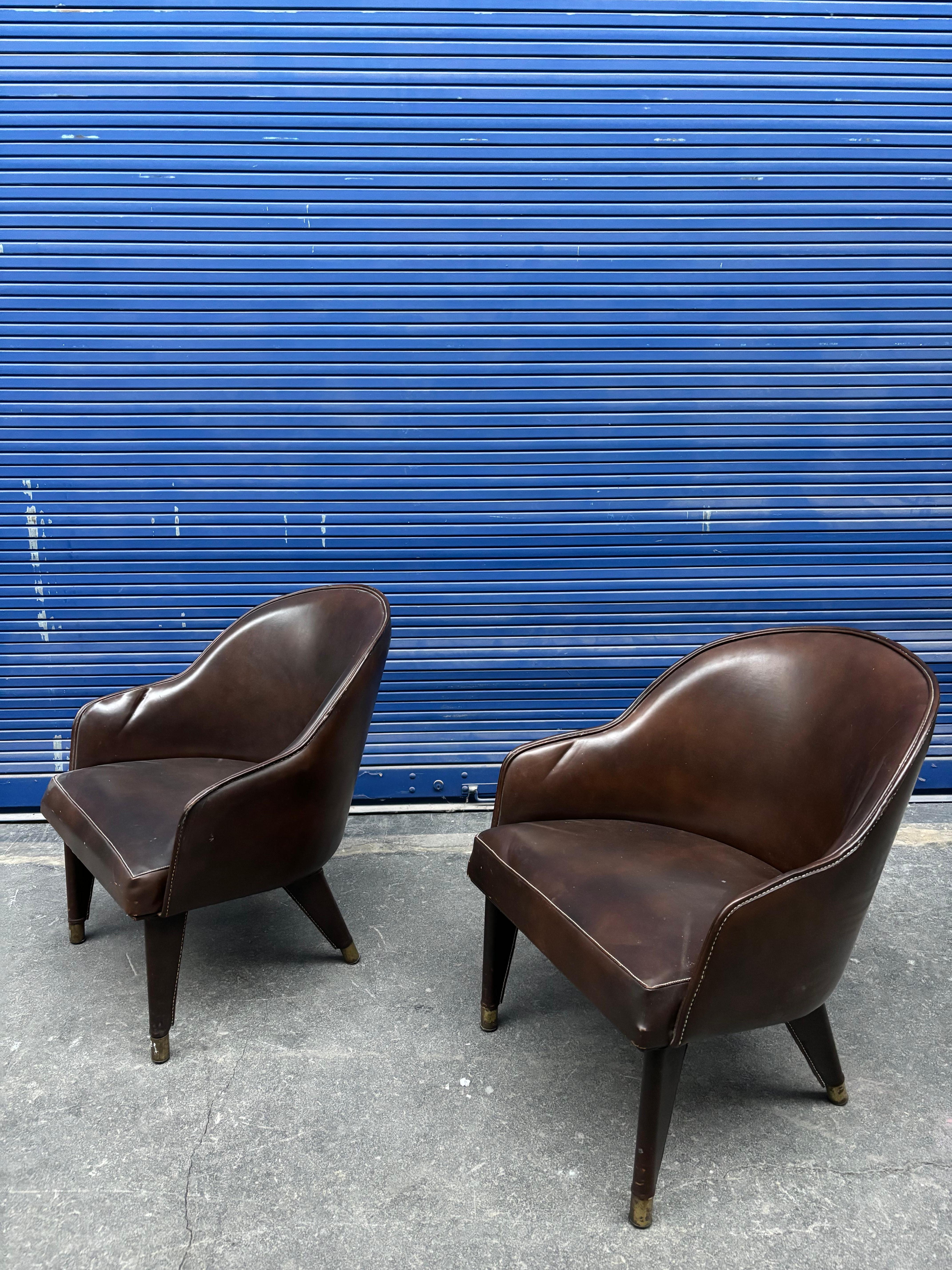 Français Paire de fauteuils de Jacques Adnet en vente