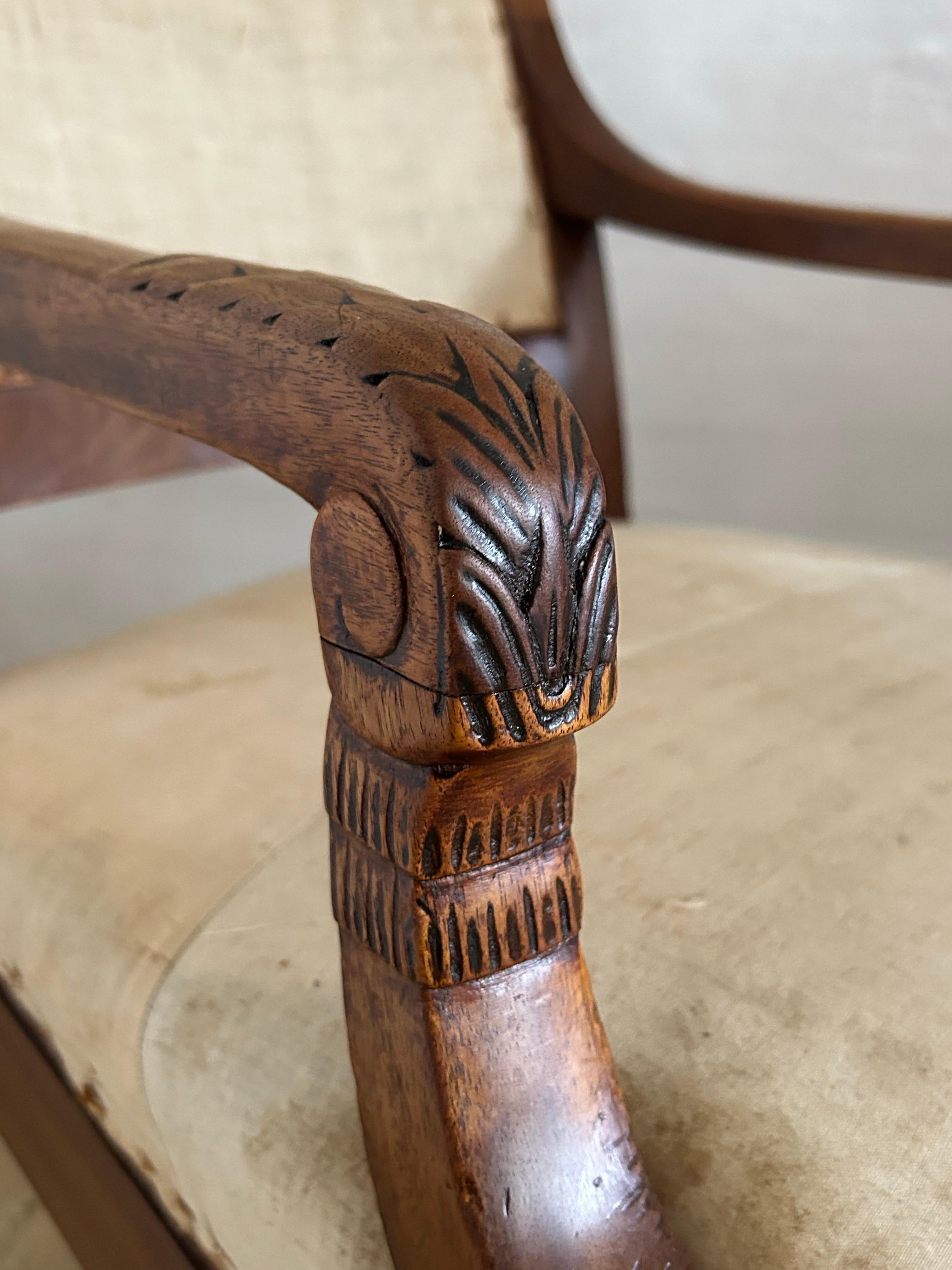 Rare and beautifully crafted pair of mahogany armchairs designed by Jens Møller-Jensen (1869–1948), retaining their original calico underlayer beneath the upholstery. These chairs offer an exceptional degree of authenticity, showing the quality and
