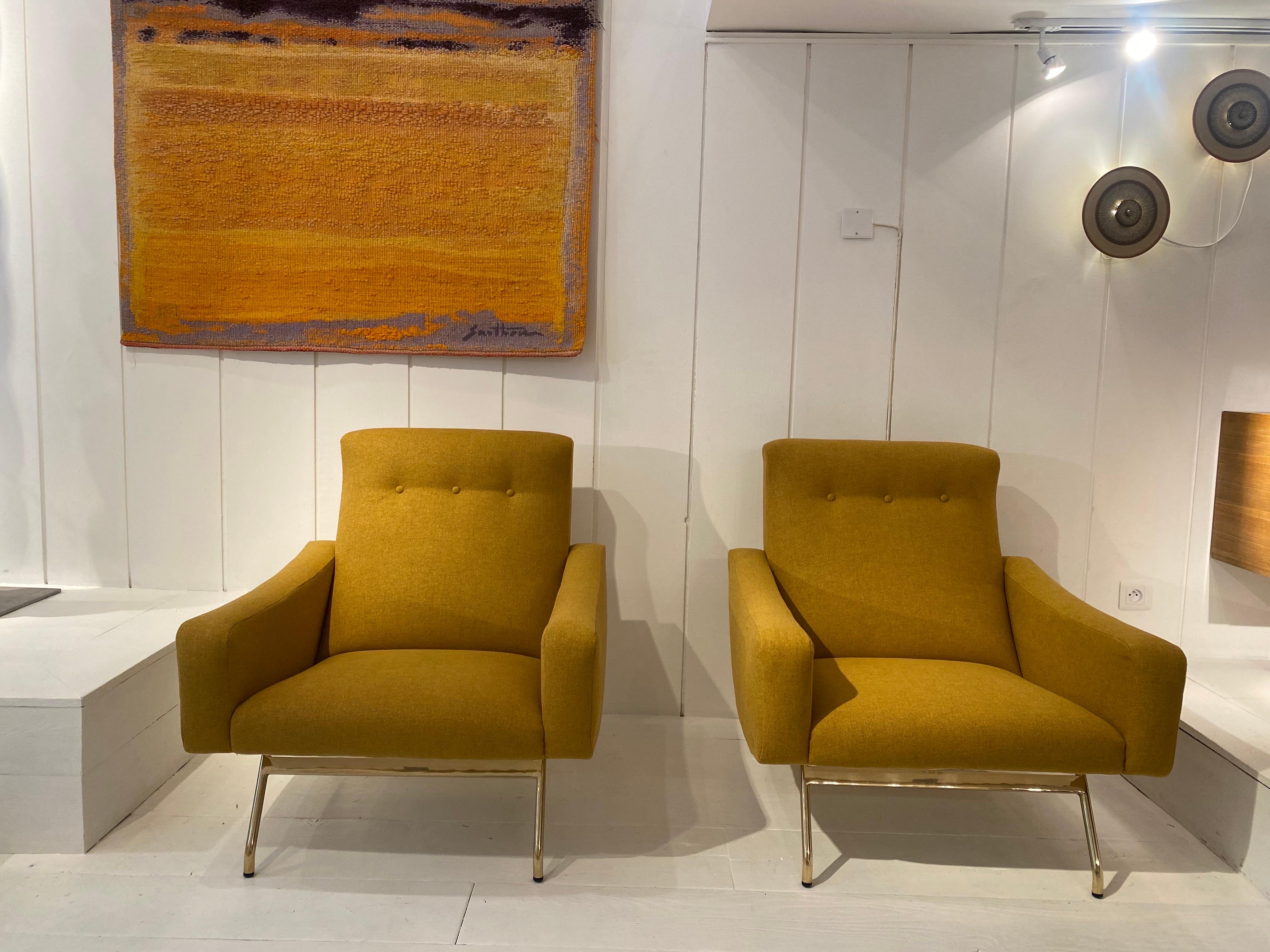 Pair of large armchairs with brass feet
Designed by Joseph Andre Motte for Steiner
France, Circa 1960
Original metal stamp by steiner
Perfect condition reuphostered.
  