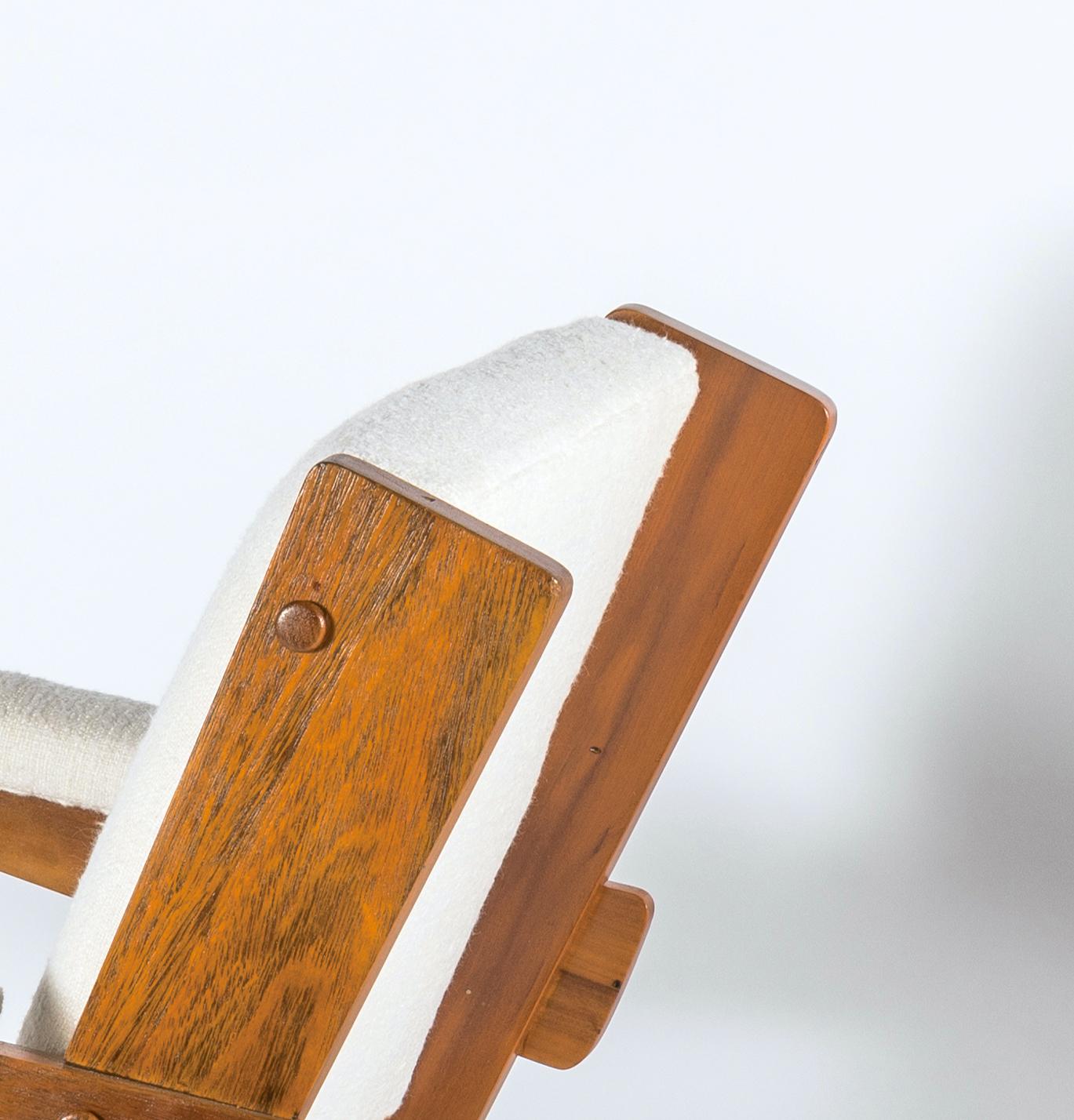 The pair of armchairs by Lina Bo Bardi (attributed.) is the Modern Brazilian mid century interpretation of European Modern design but with the twist of tropical wood, Peroba wood. Still in process of attribution, the armchair got all the character