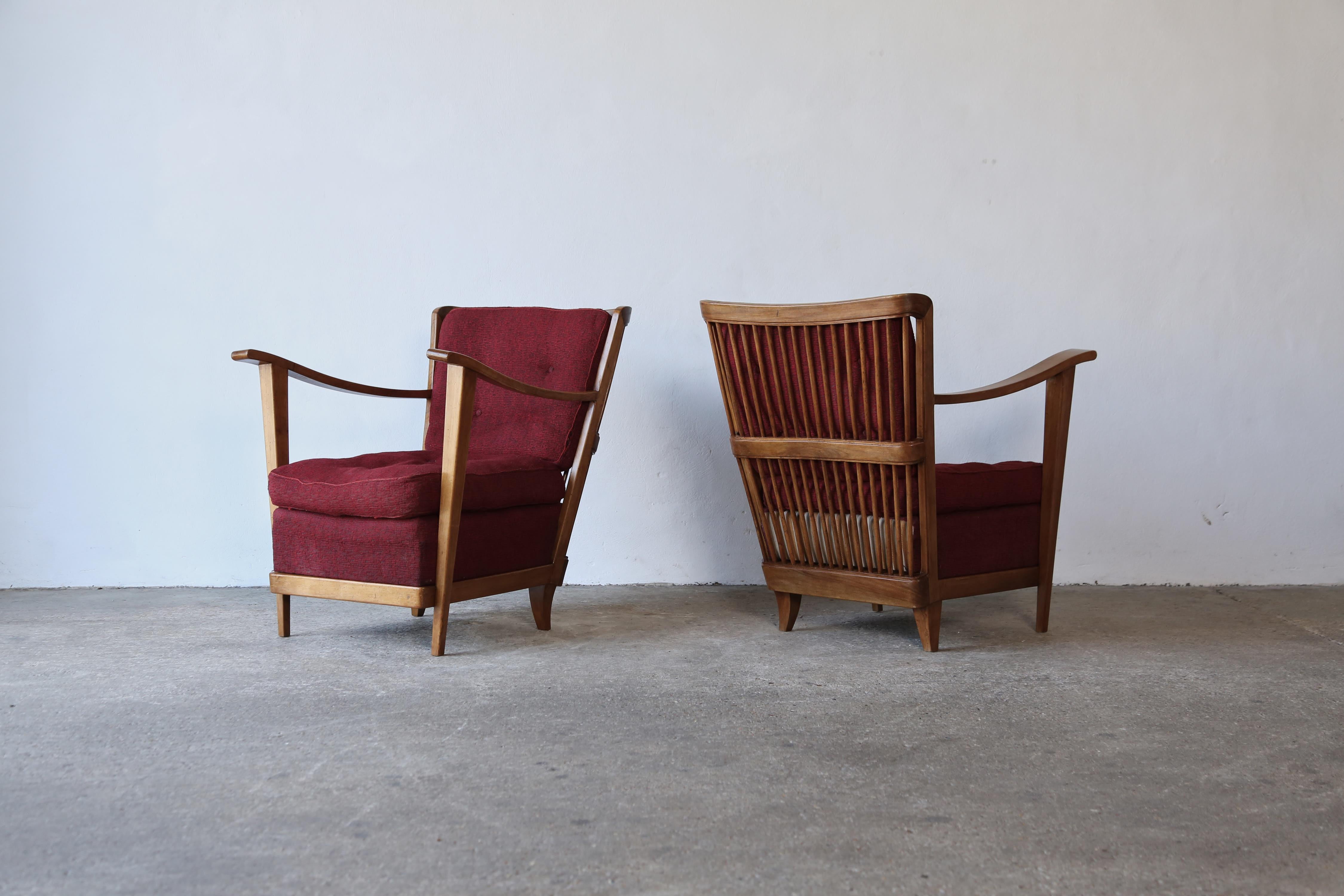 A wonderful and rare pair of armchairs by Maurizio Tempestini, Italy, 1950s.   The chair cushions require new fabric.    Fast shipping worldwide.
  
