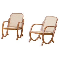 Paire de fauteuils de Moveis Gerdau, bois cintré et rotin, 1930