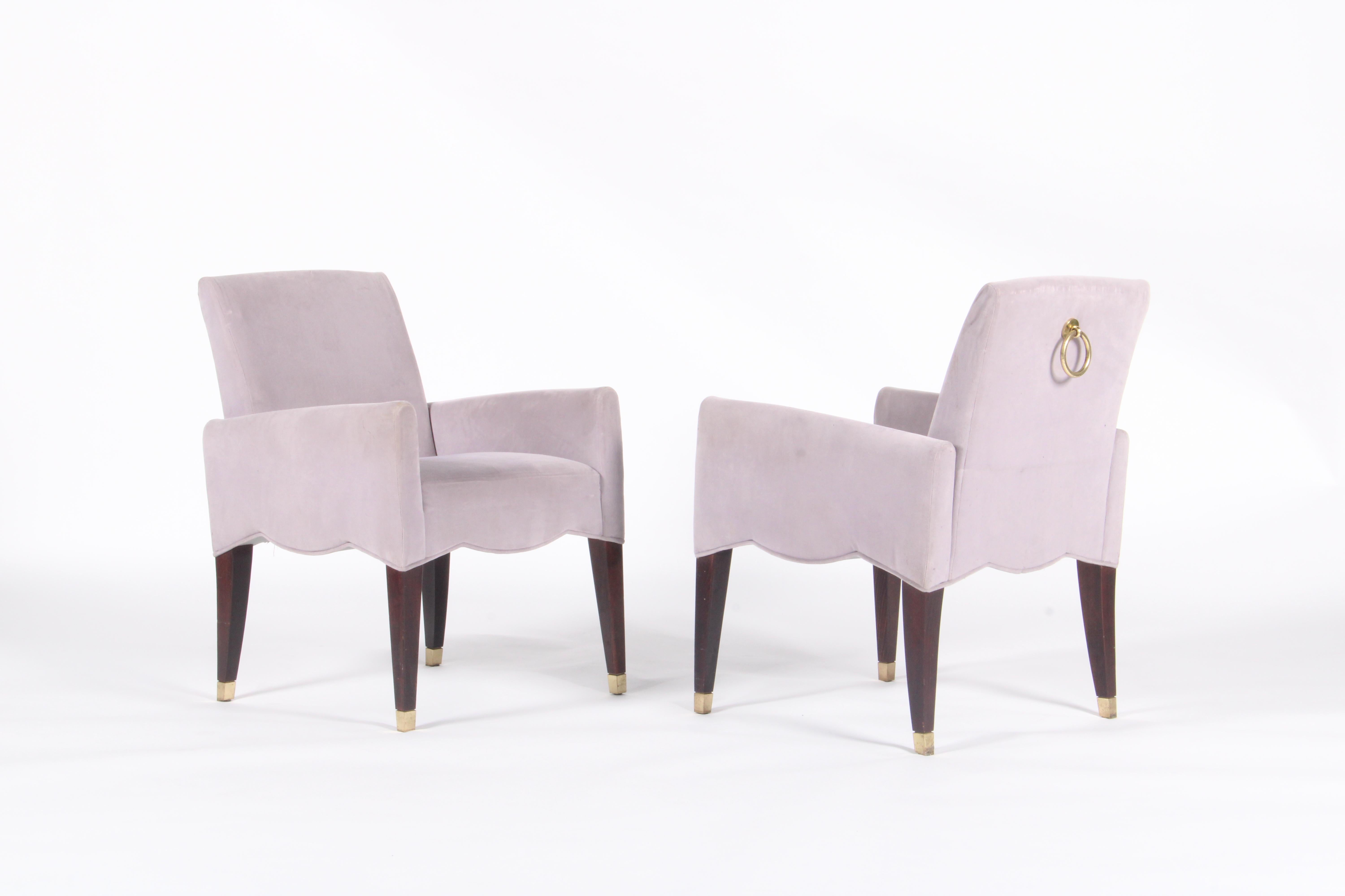 A rare opportunity to own a piece of furniture history from one of the most iconic museums in the world, Le Cafe Marly at the Lourvre museum in Paris. Designed in 1994 by the internationally acclaimed Oliver Gagnere this fantastic pair of armchairs