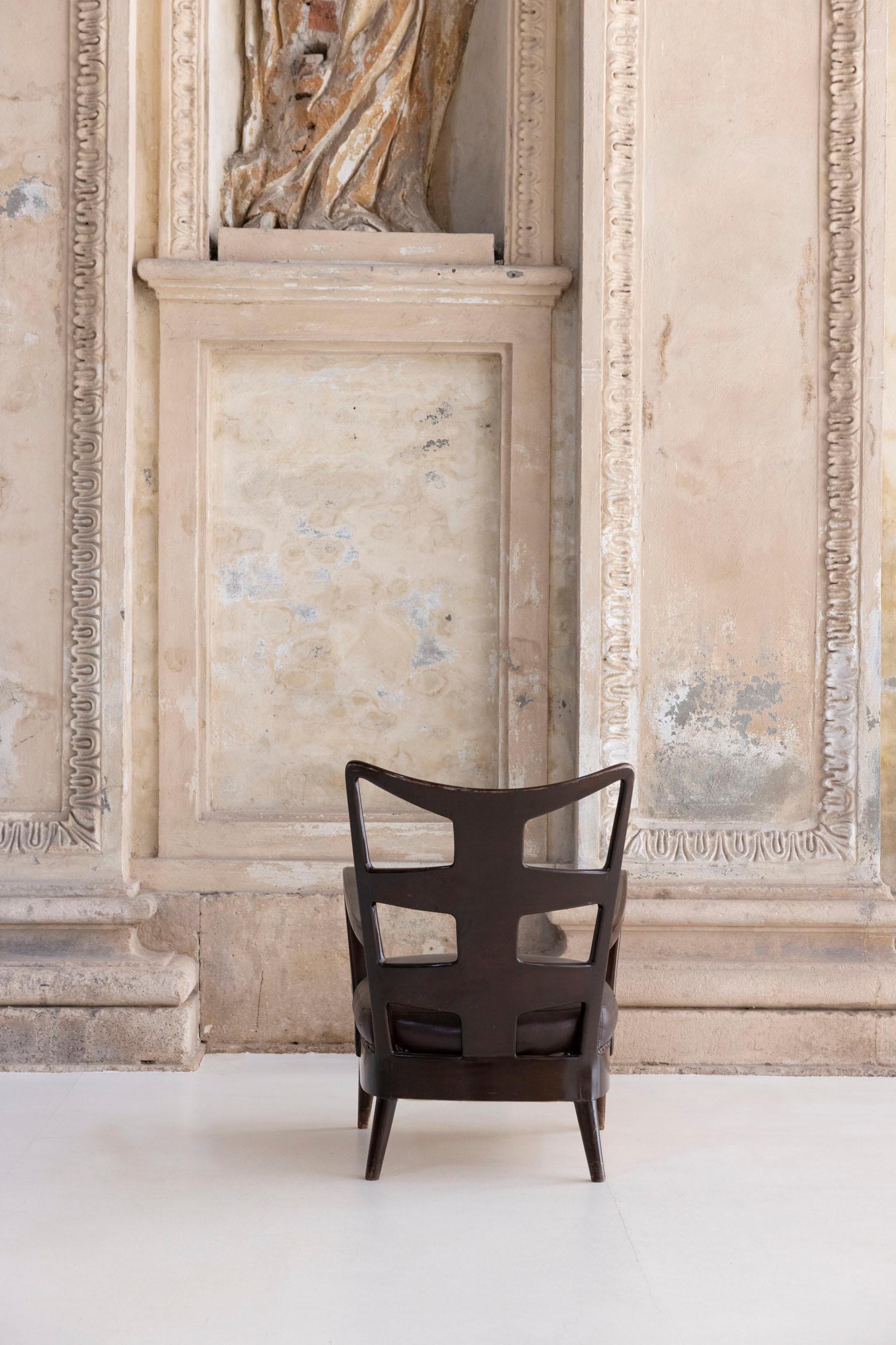 Leather Pair of armchairs by Osvaldo Borsani, model 6575 For Sale