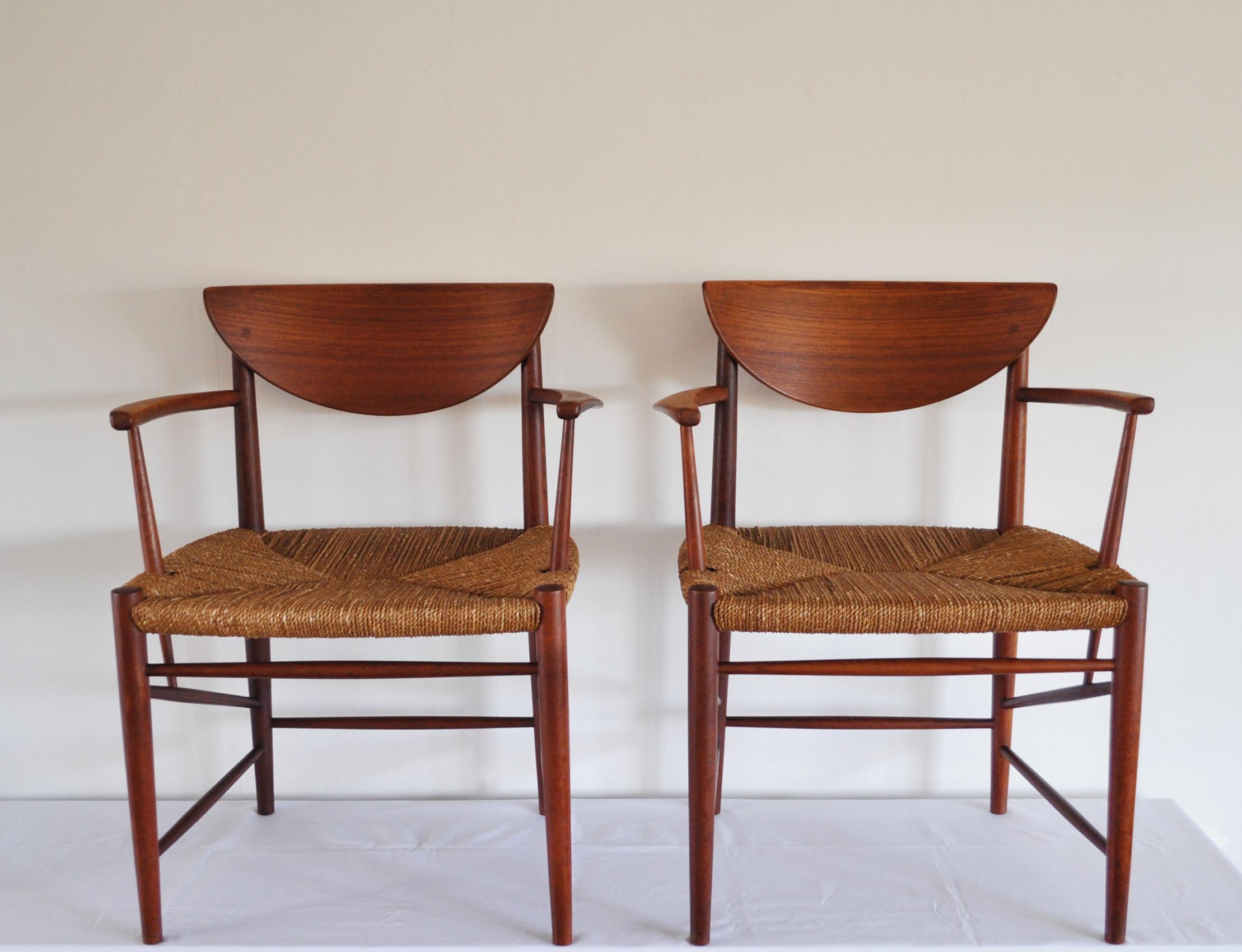 A pair of armchairs model 317 designed by Peter Hvidt & Orla Mølgaard-Nielsen made of solid teak wood with original cord seat. Manufactured by Søborg Møbelfabrik, 1956.
Very good condition, with minor signs of usage.

Dimensions:
Width 61