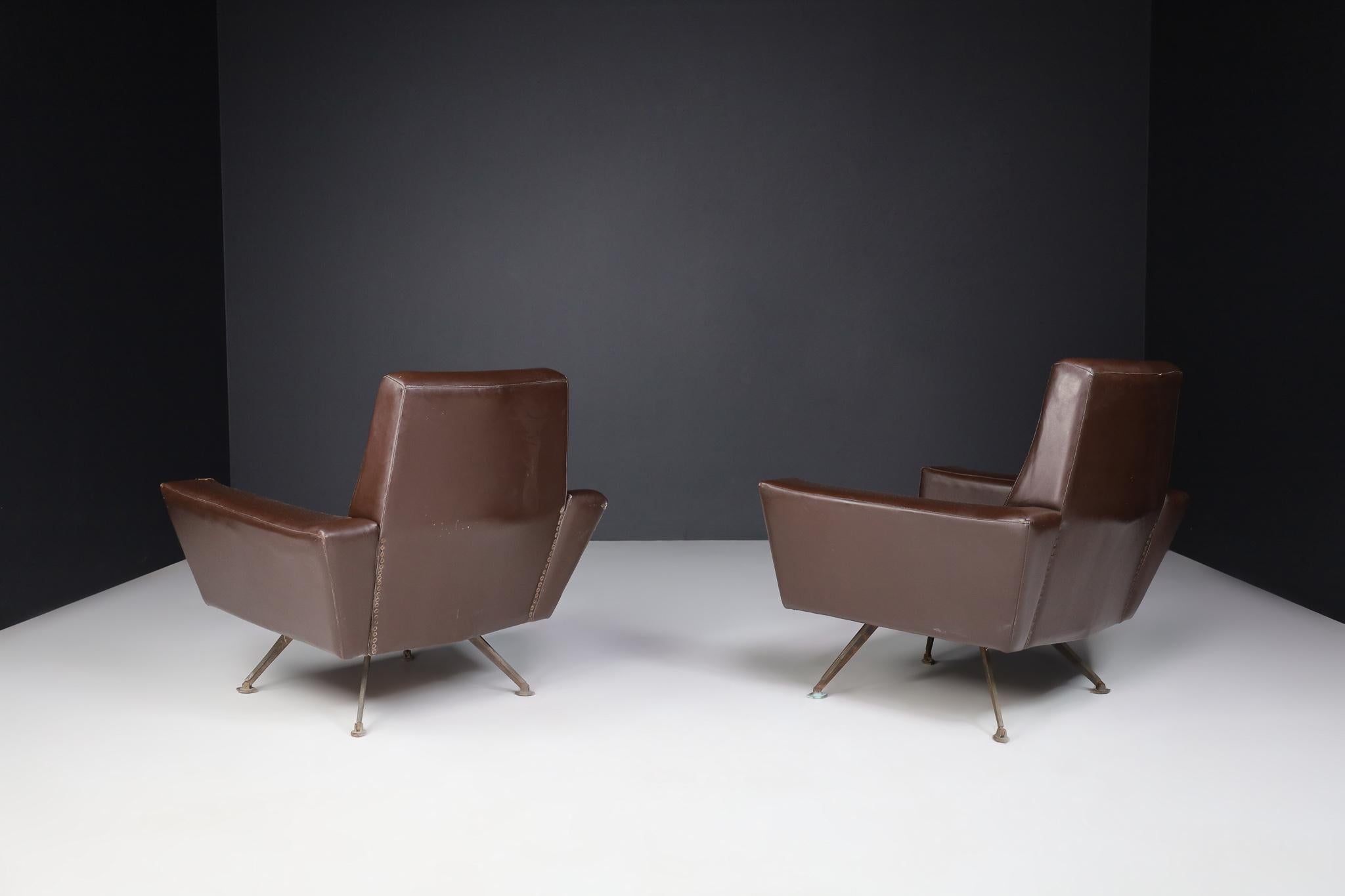 Italian Pair of Armchairs by Studio Tecnico Italy A.P.A. and Designed by Lenzi 1950s For Sale