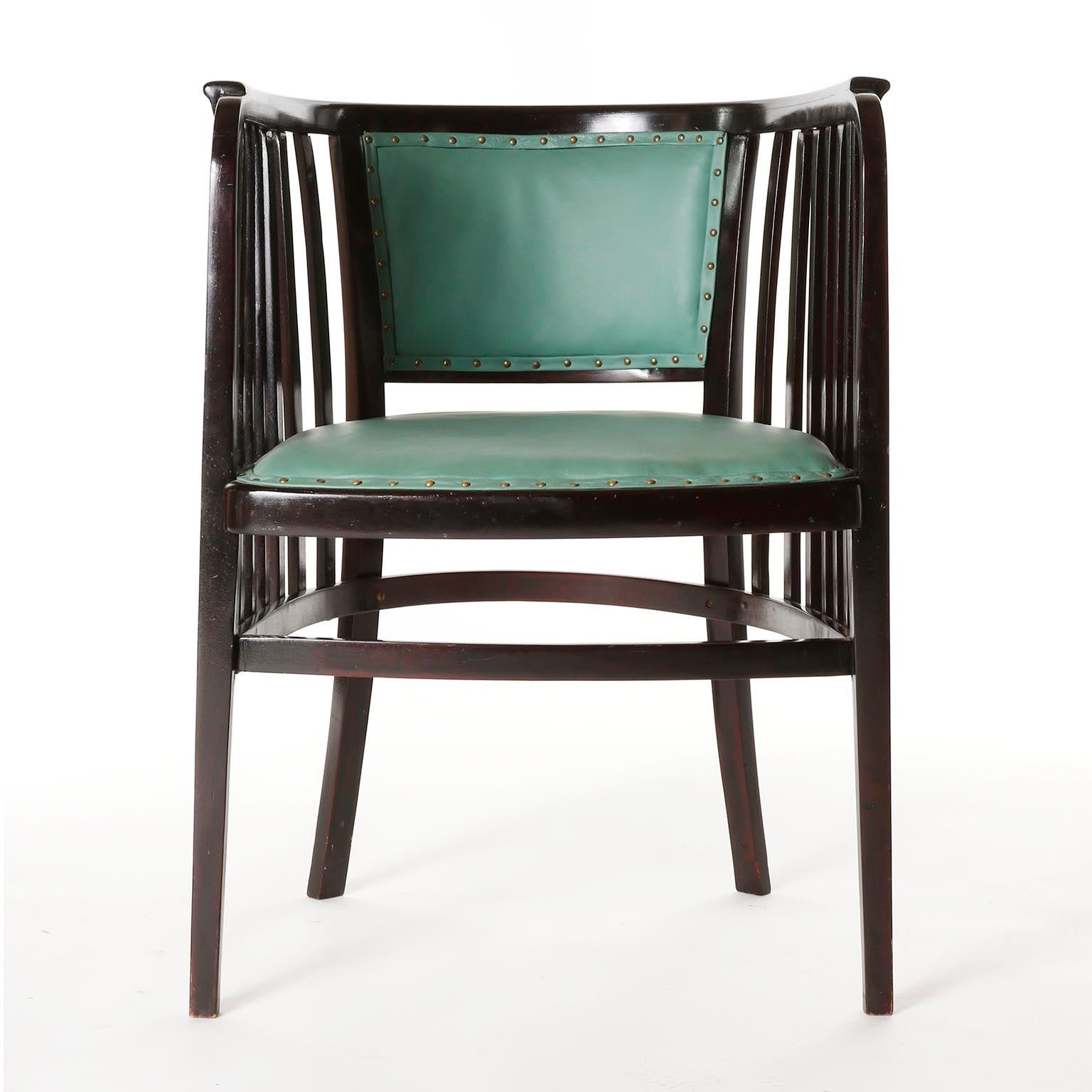 A pair of fantastic bentwood armchairs designed by Marcel Kammerer and manufactured by Thonet, Austria, circa 1910.
They are made of dark or almost black stained beech wood in mahogany tone and French polished, a technique that involves hand