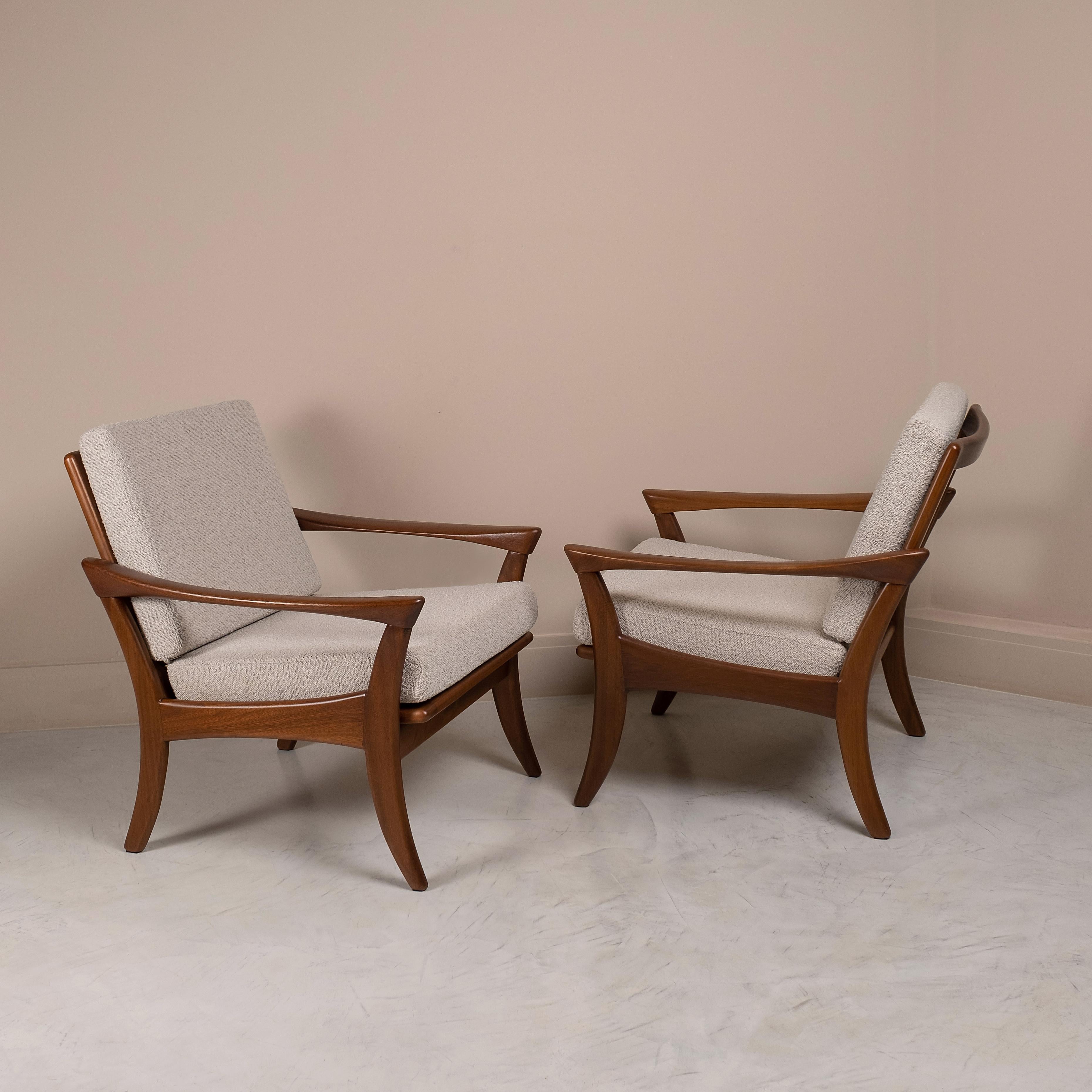 Beautiful pair of armchairs by De Ster Gelderland made in  Netherlands in the 50/60s
Teak wood frame completely restored.
The original latex straps on the seats have been replaced with leather ones.
Brand new upholstered  in premium beige bouclé