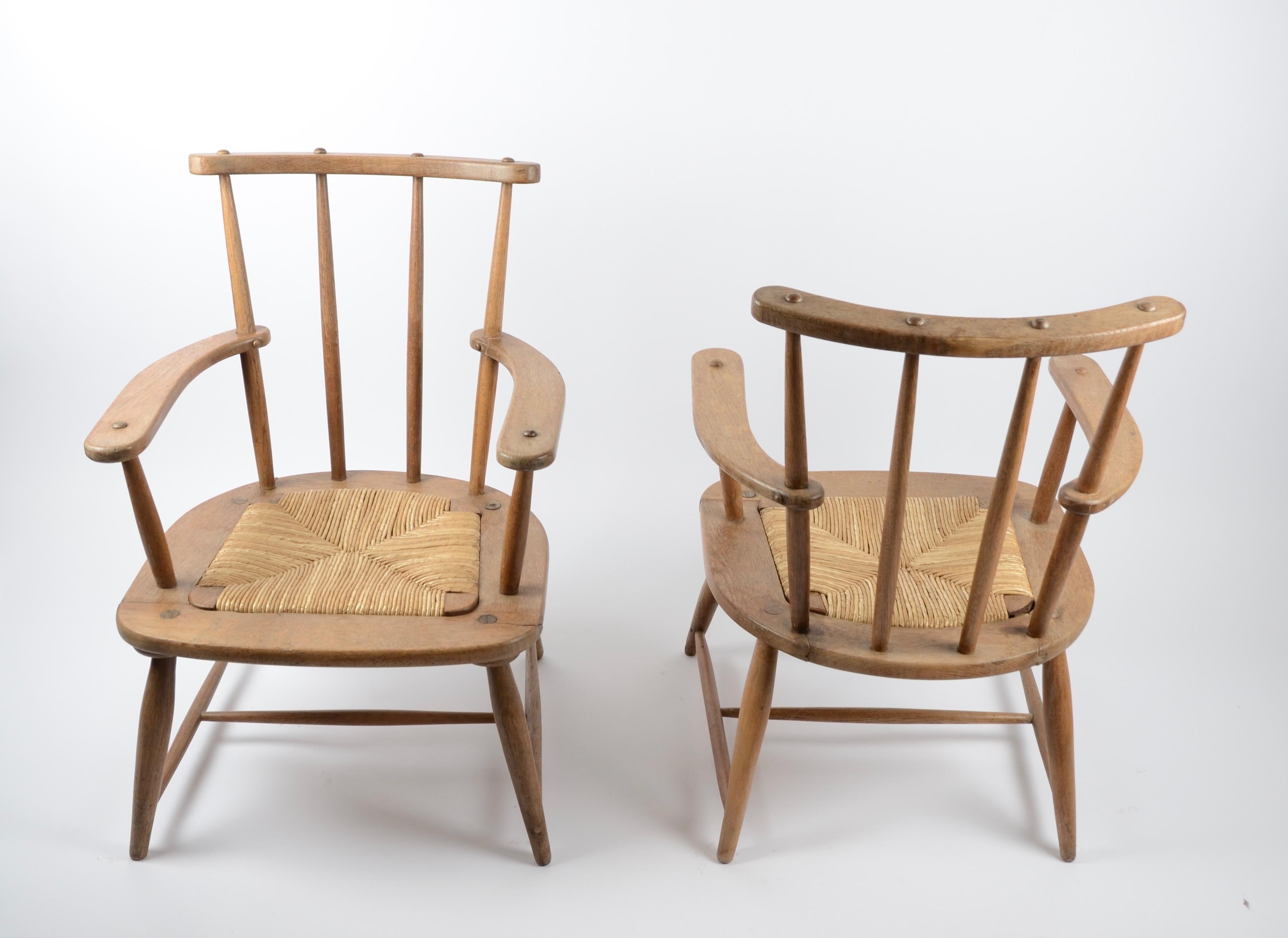 Armchairs, a pair in rattan and wood. France, 1920s-1930s.