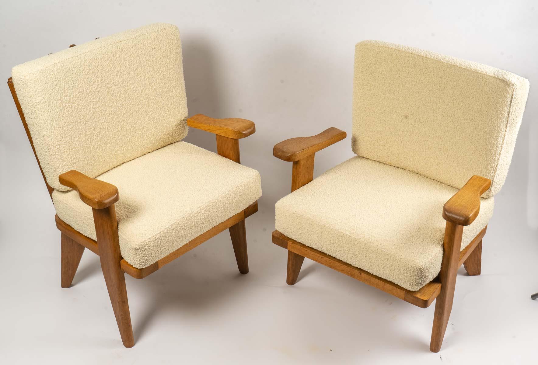 Pair of armchairs Guillerme and Chambron
Pair of armchairs in light oak. The upholstery is in white buckle redone to new. Work from the 60's. Excellent condition. 
Measures: H: 85 cm, W: 69 cm, D: 57 cm
H: 77 cm, W: 73 cm, D: 63 cm.