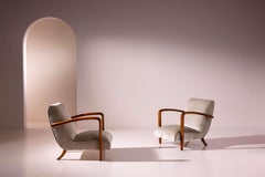 Pareja de sillones en fresno y tela tapizada, fabricación italiana, años 50