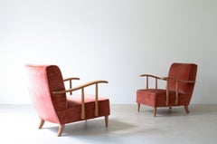 Pair of armchairs in blond wood and padded fabric.