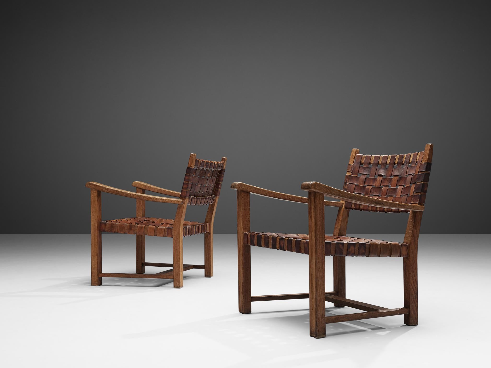 European Pair of Armchairs in Cognac Leather and Oak For Sale