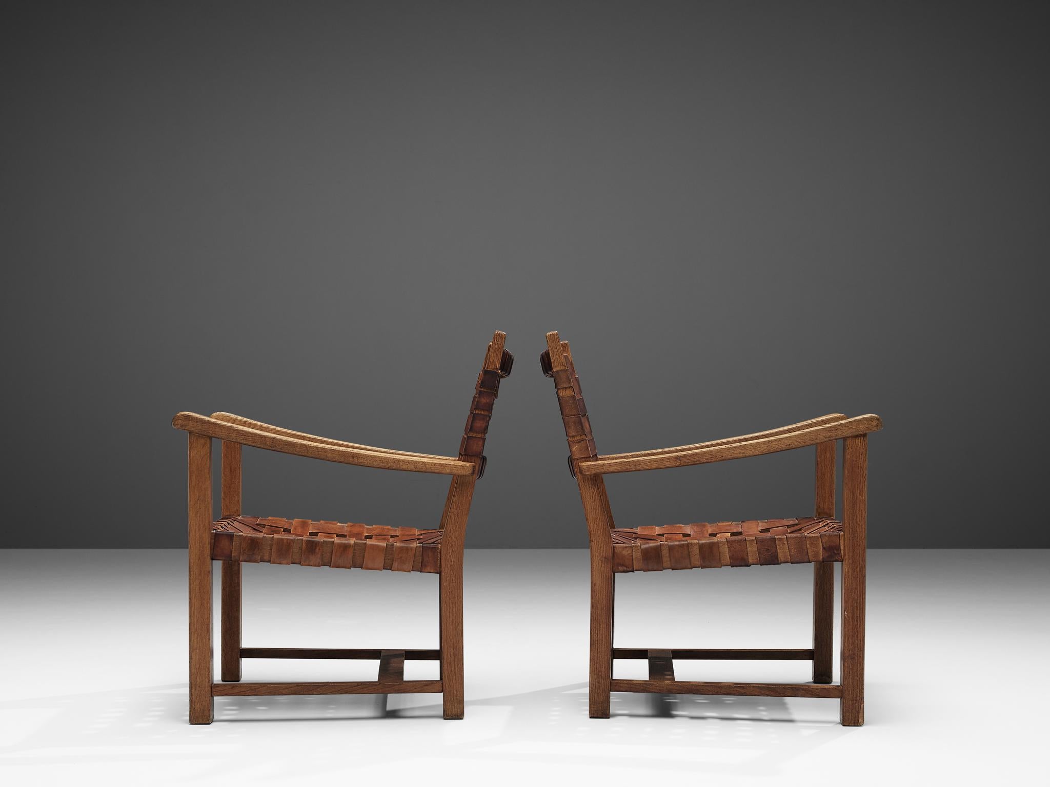 Mid-20th Century Pair of Armchairs in Cognac Leather and Oak For Sale