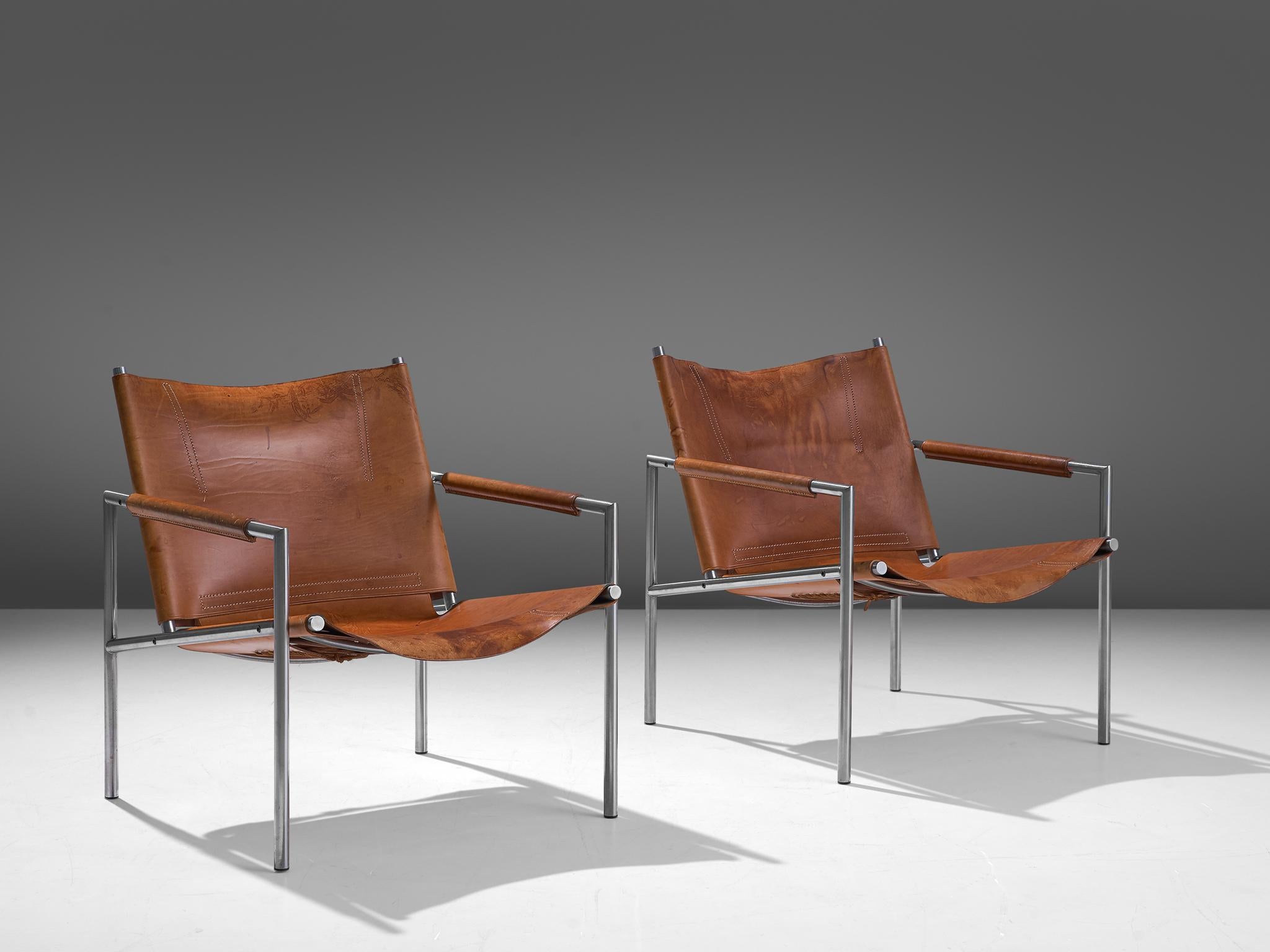 Martin Visser, pair of armchairs, leather and metal, The Netherlands, 1965.

These modern, Minimalist easy chairs are executed with a tubular brushed steel frame in combination with soft, patinated cognac leather upholstery. The armrests are