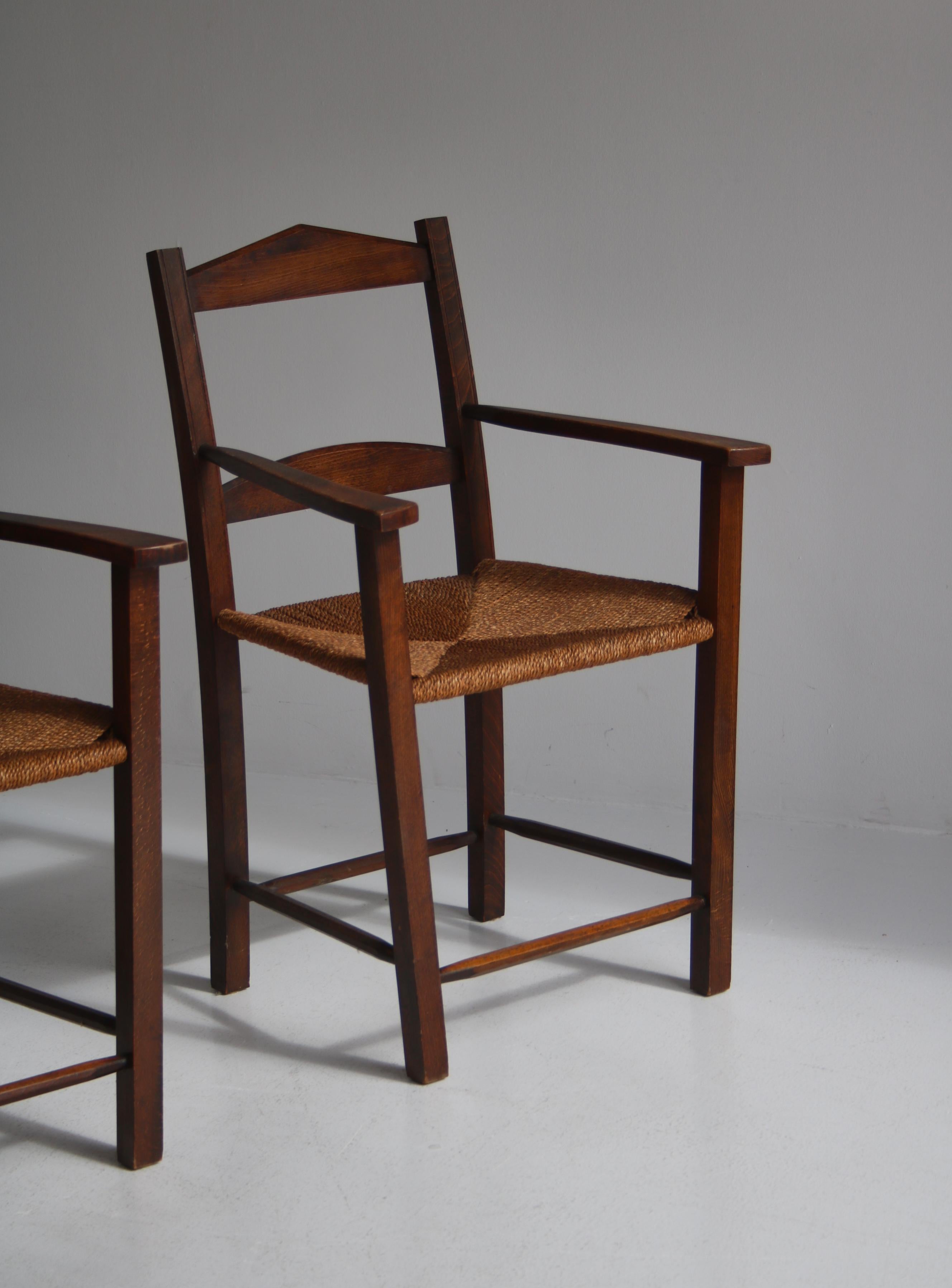Mid-20th Century Pair of Armchairs in Dark Stained Pine and Seagrass Danish Cabinetmaker, 1940s For Sale