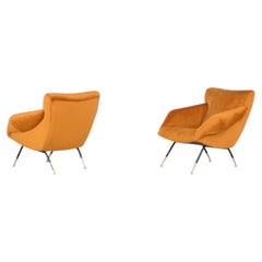 Pair of armchairs in fabric, Italy 1960s.