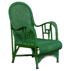 Pair of armchairs in green woven rattan, 1970s