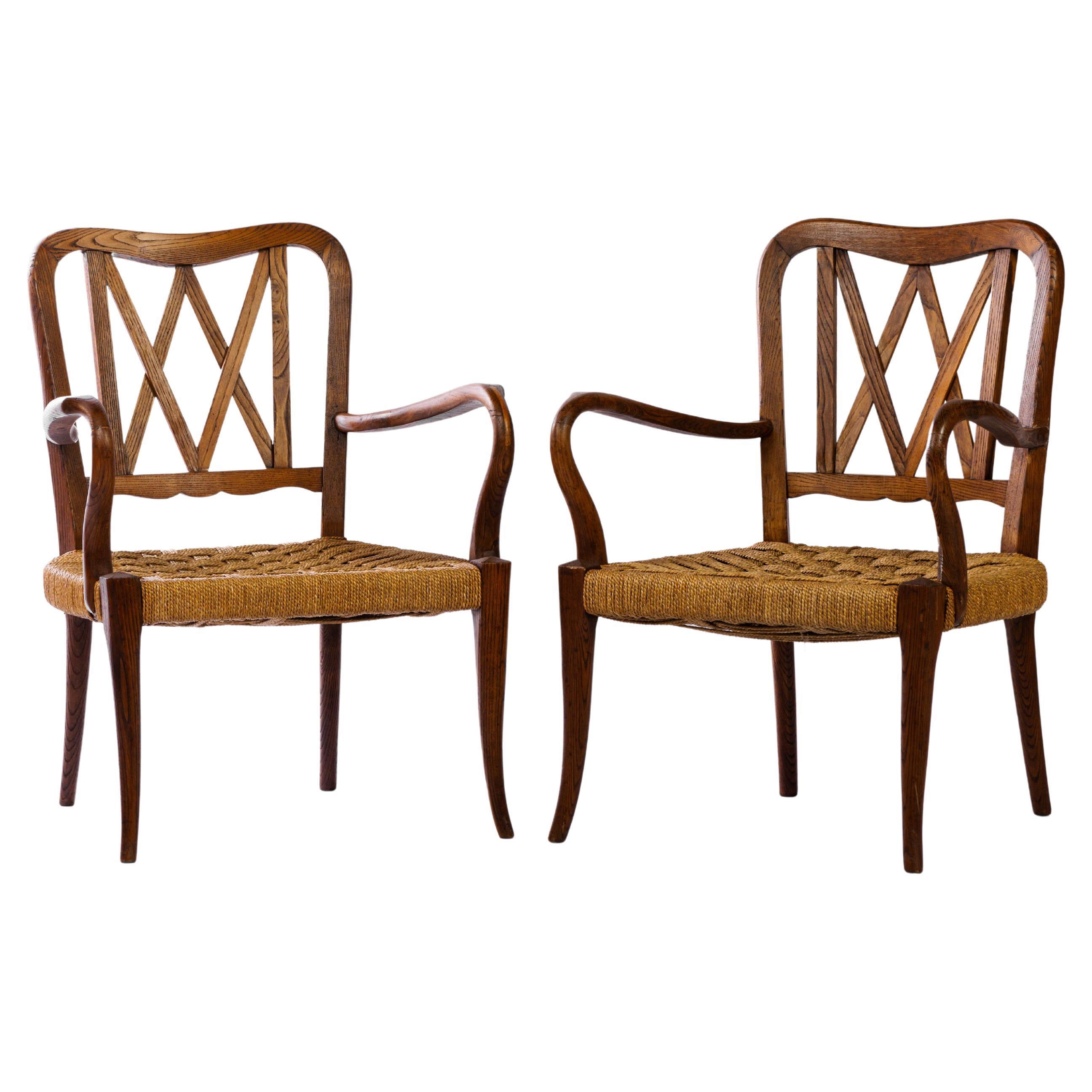 Pair of armchairs in oak and rope, french work circa 1950 For Sale